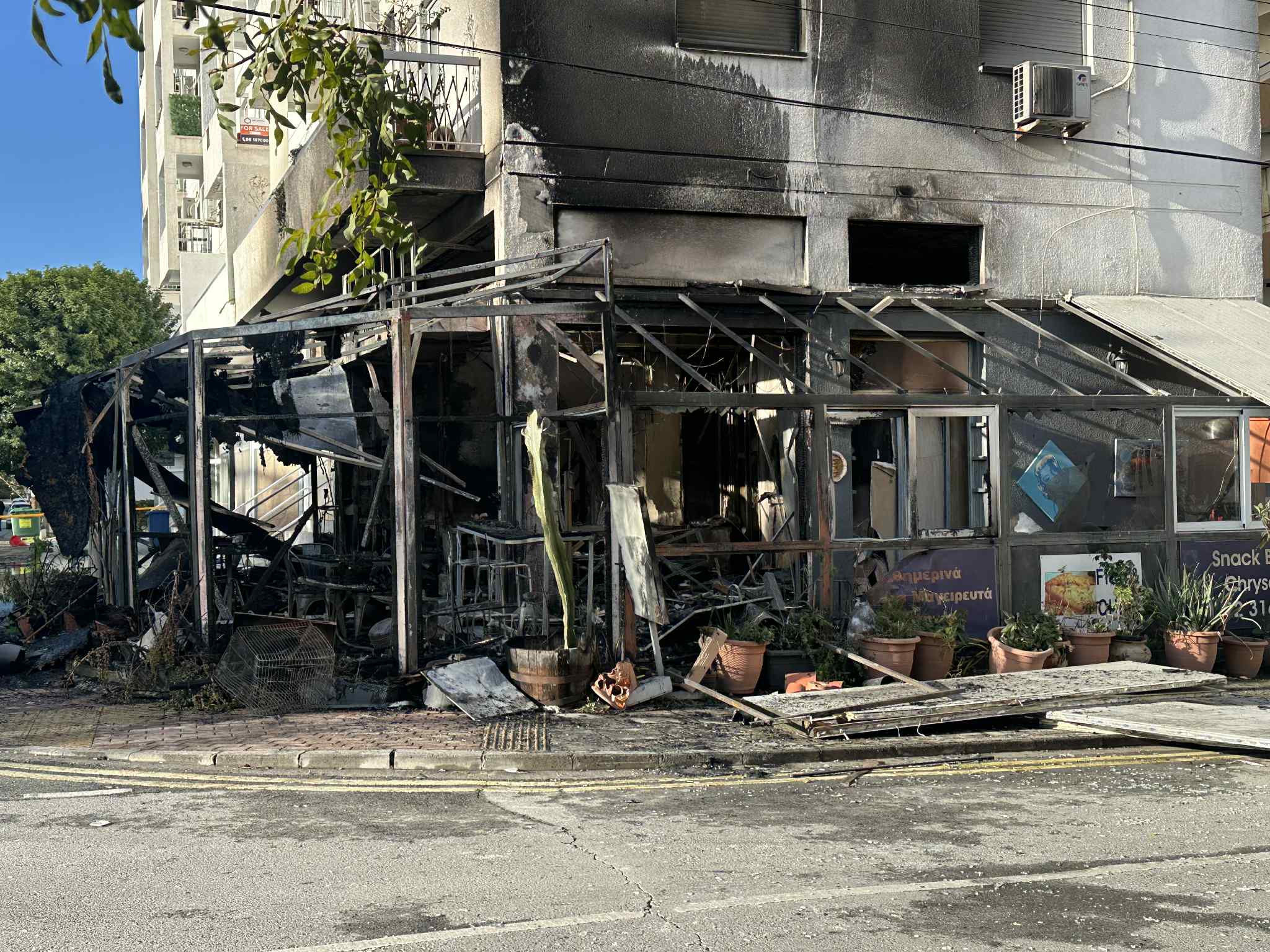 cover Dawn explosion damages Nicosia restaurant