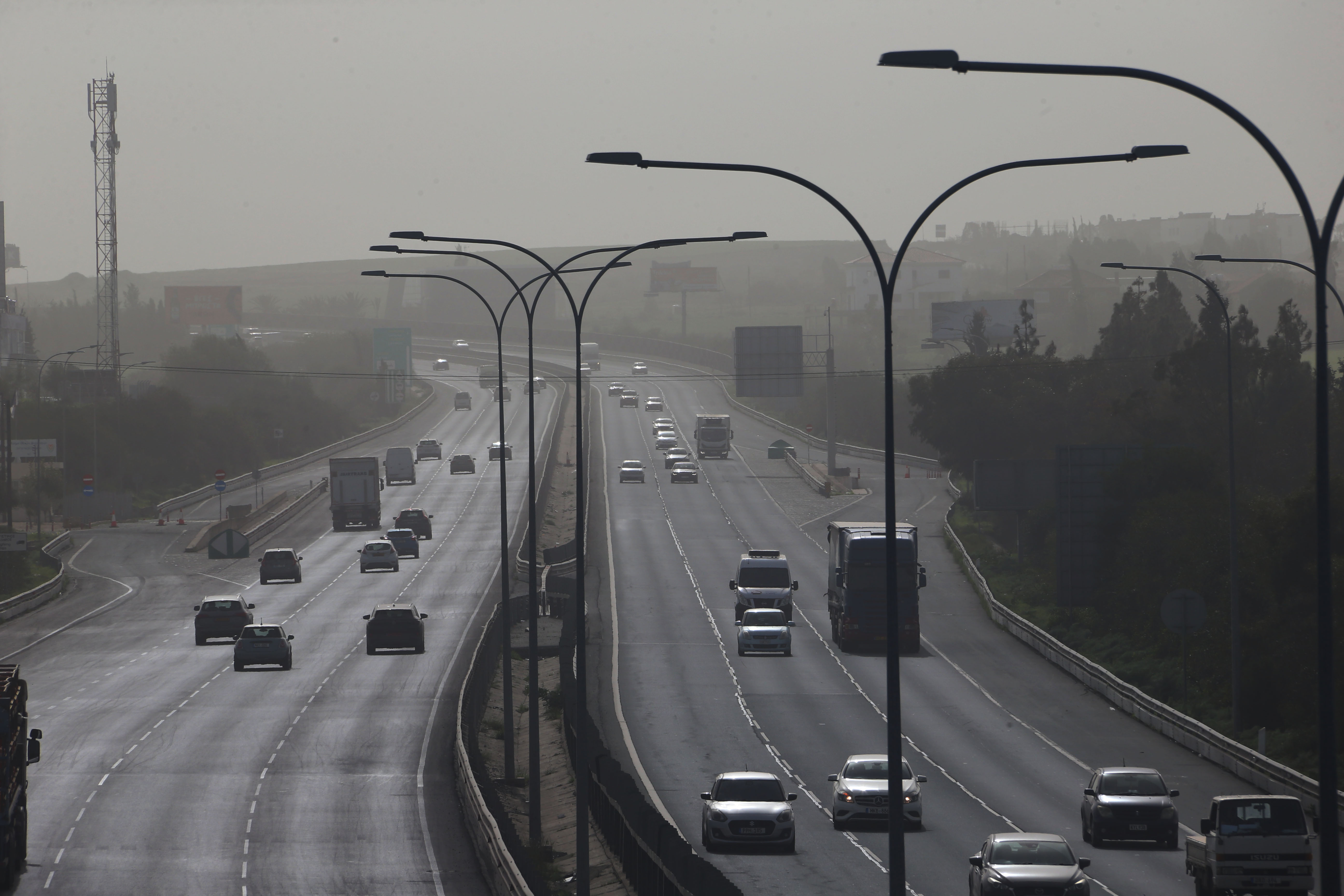 image Mist on Monday gives way to rain; dust to remain all day