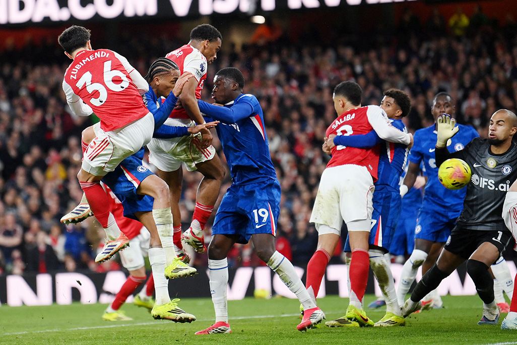 cover Timber header earns Arsenal crucial win over Chelsea