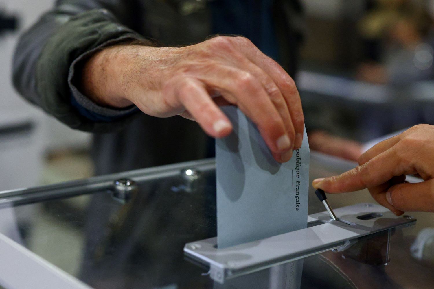 image Paris and Marseille in focus as French vote in local election runoffs