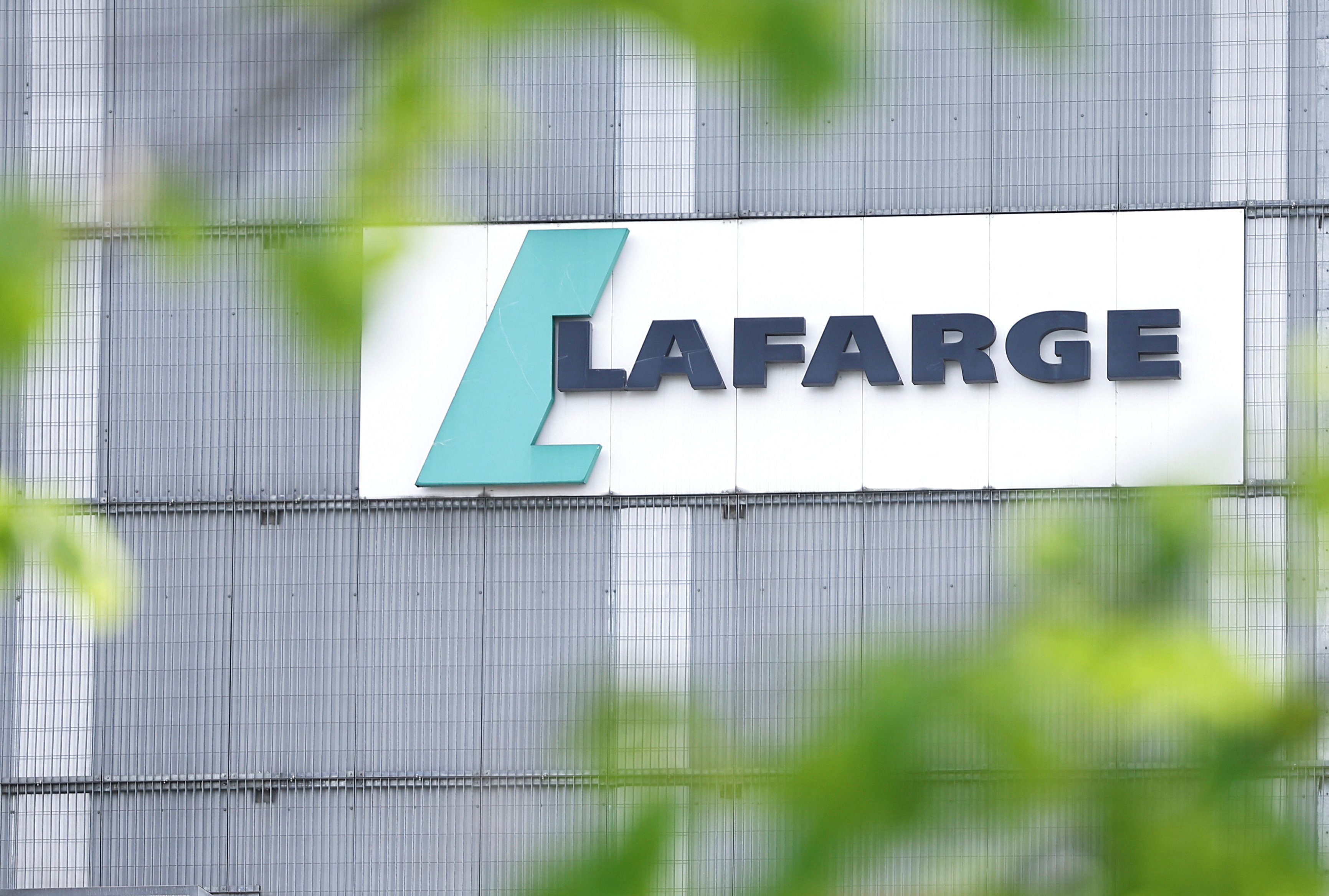 cover French cement maker Lafarge found guilty of financing jihadists in Syria