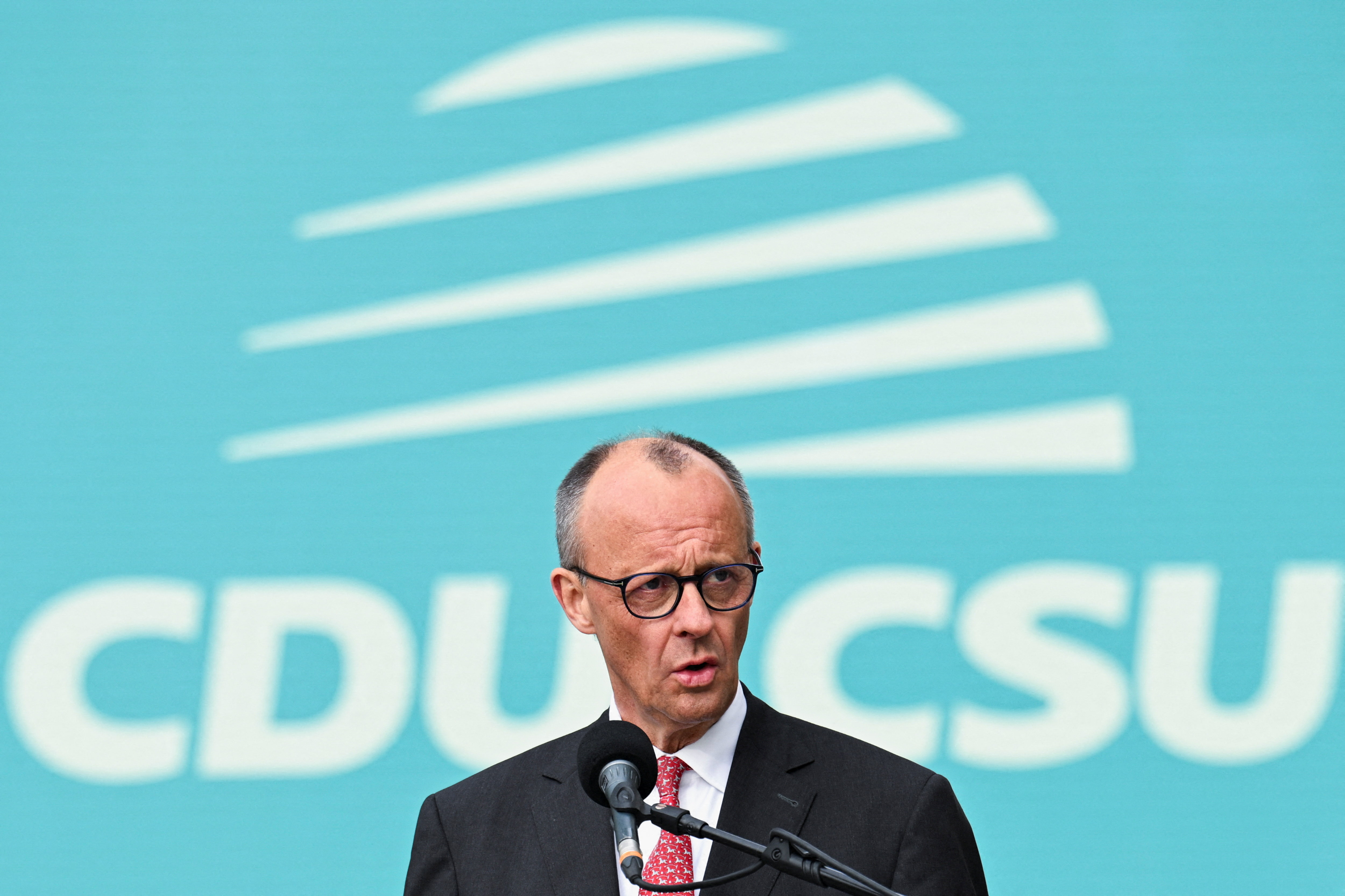 image Trump hits back at German chancellor after Iran criticism