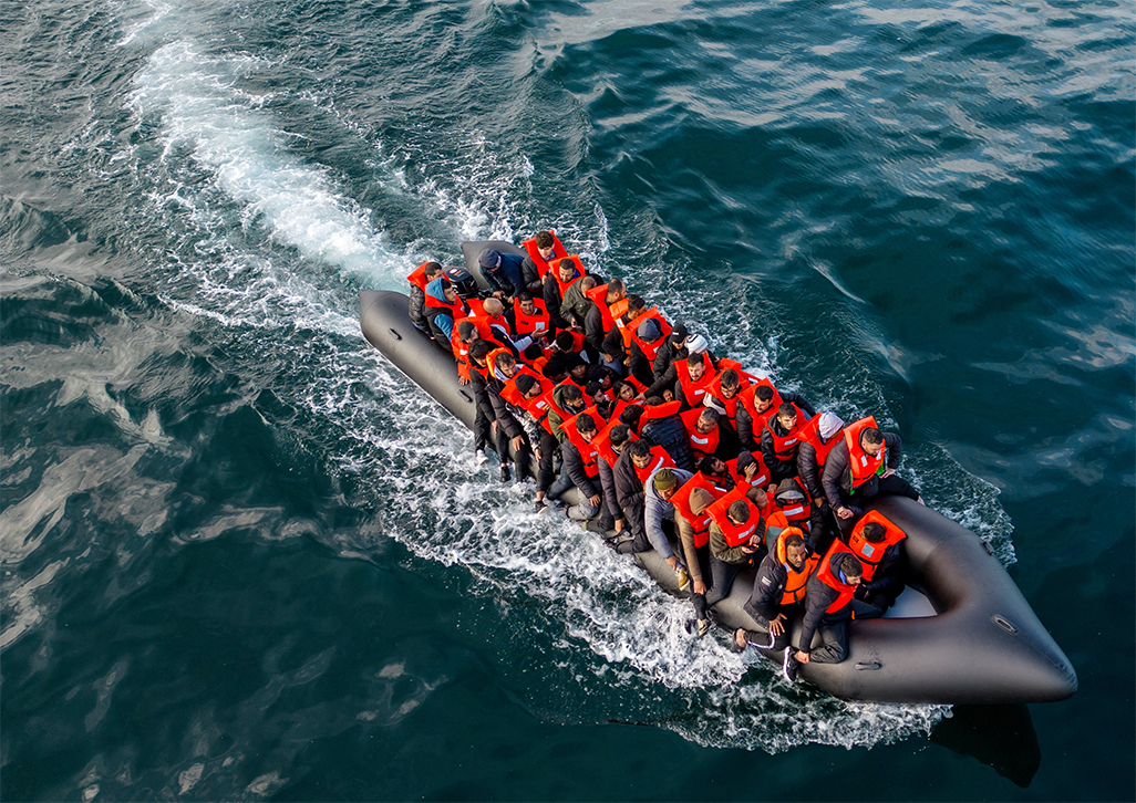 cover Nearly 8,000 people died or disappeared trying to migrate in 2025