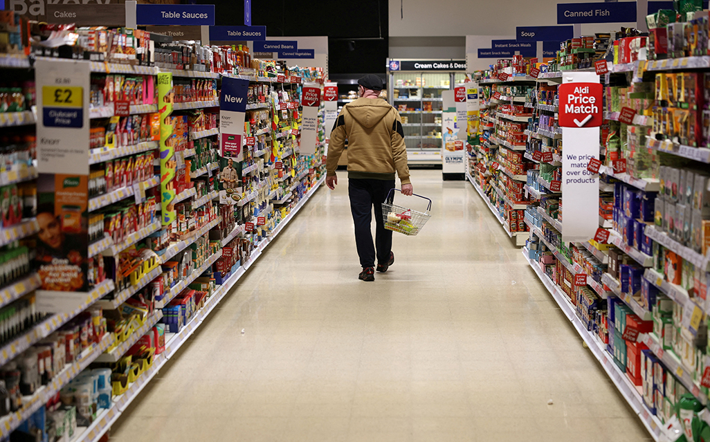 cover UK rules out mandatory supermarket price caps