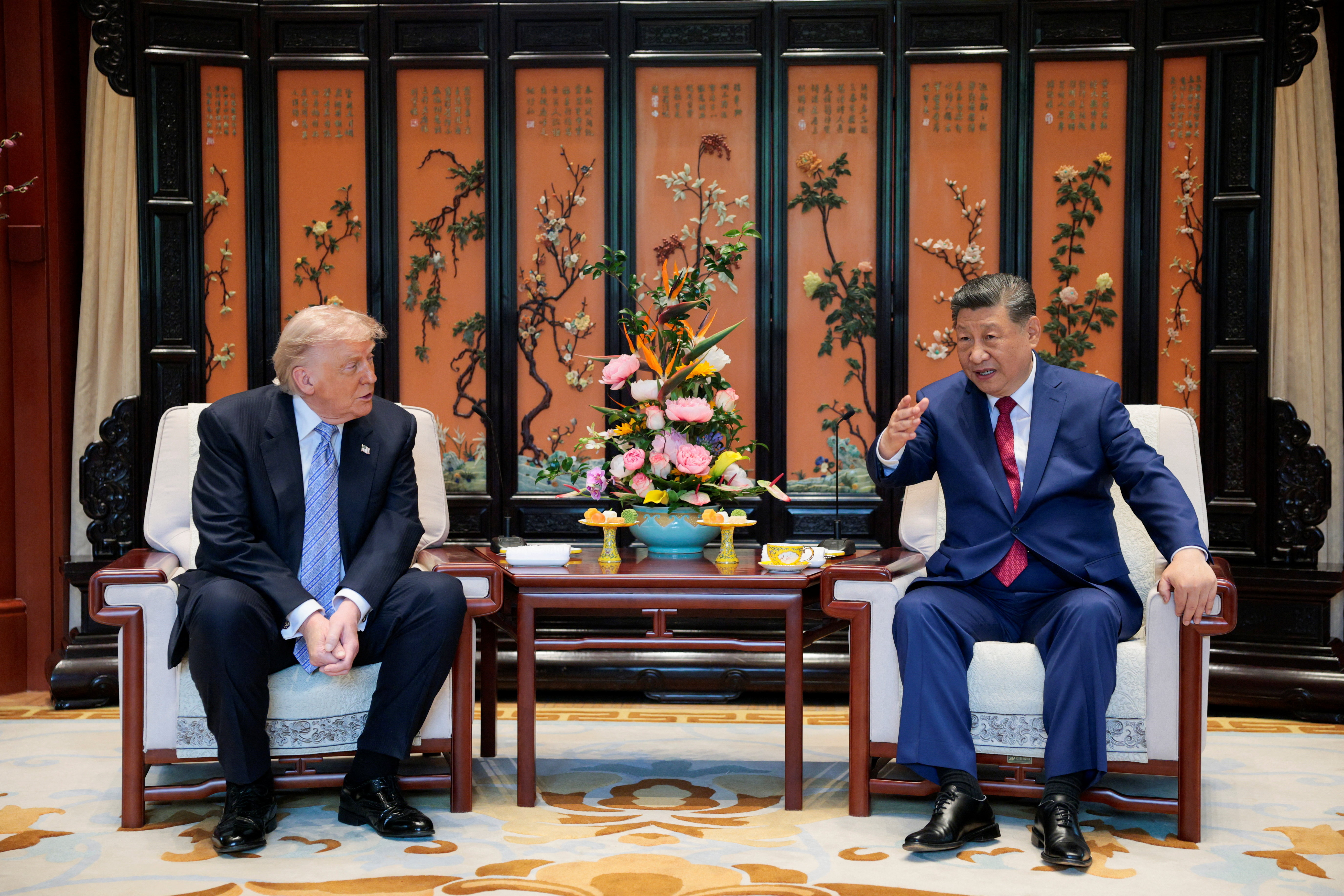 cover Trump touts business wins as China airs Iran, Taiwan concerns