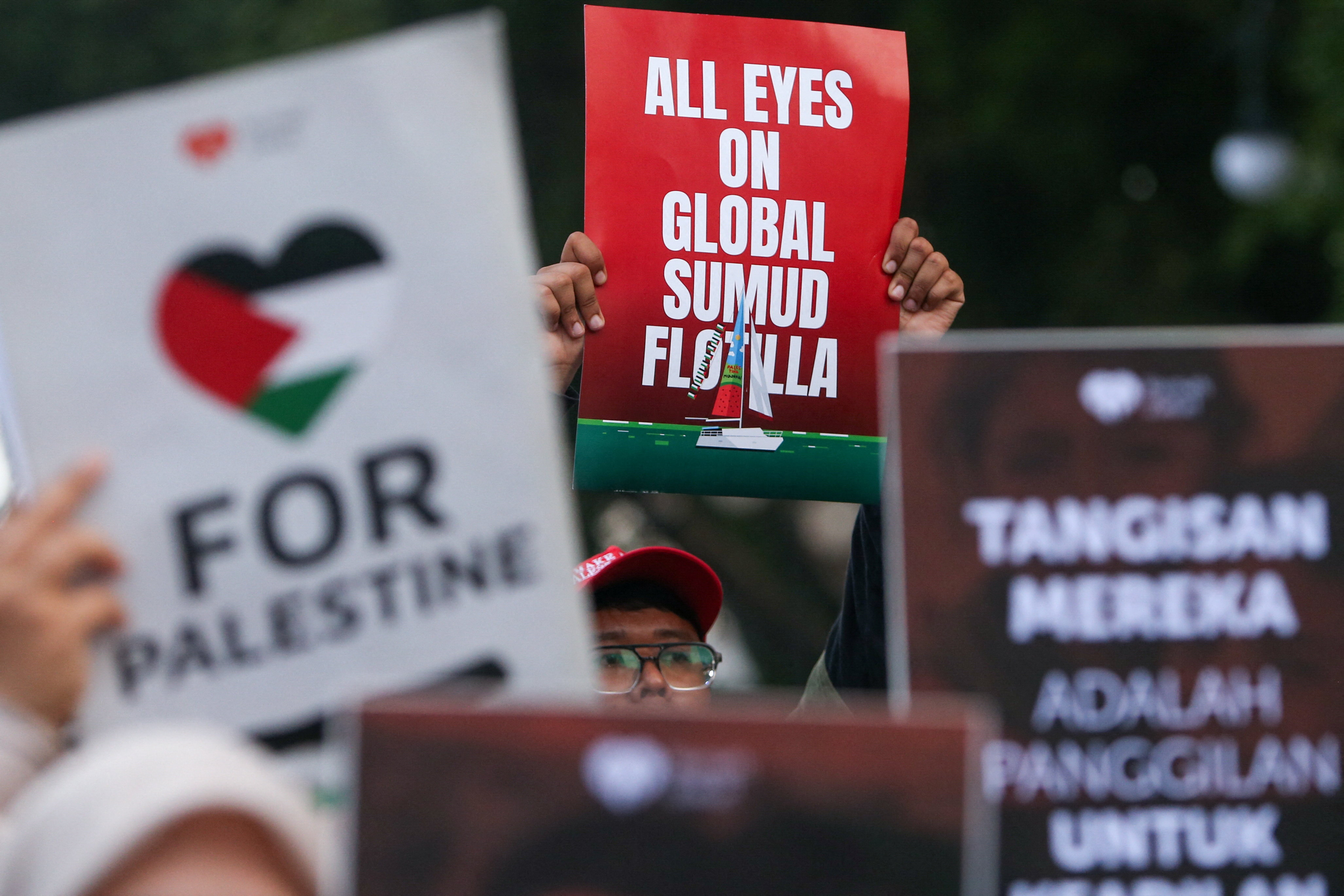 cover Israeli forces fired shots at Gaza flotilla, 48 boats intercepted