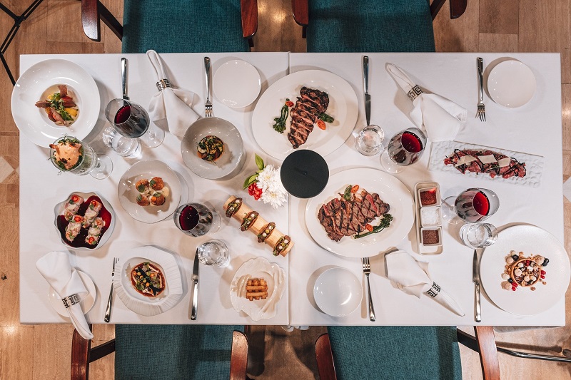 cover Bacchus Fire + Raw: Columbia Beach Resort presents new culinary concept