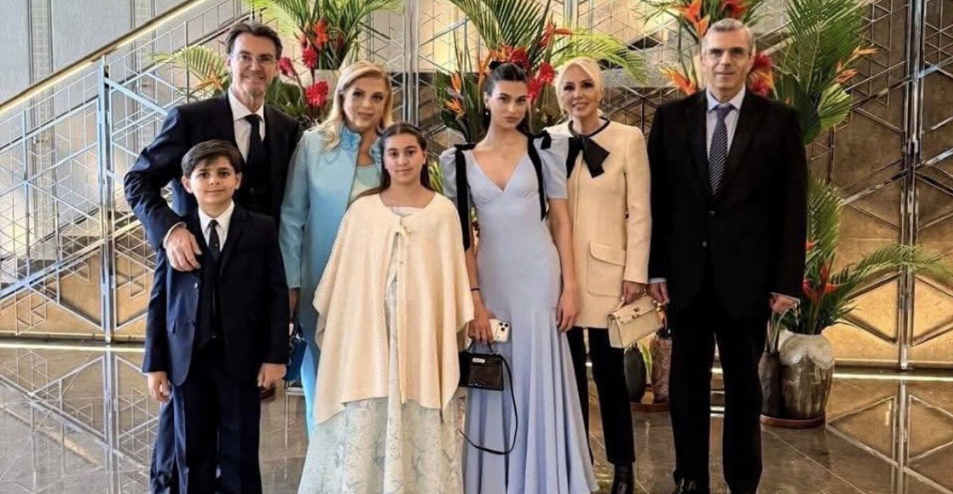 cover Hajioannou family returns to Buckingham Palace for King Charles charity event 