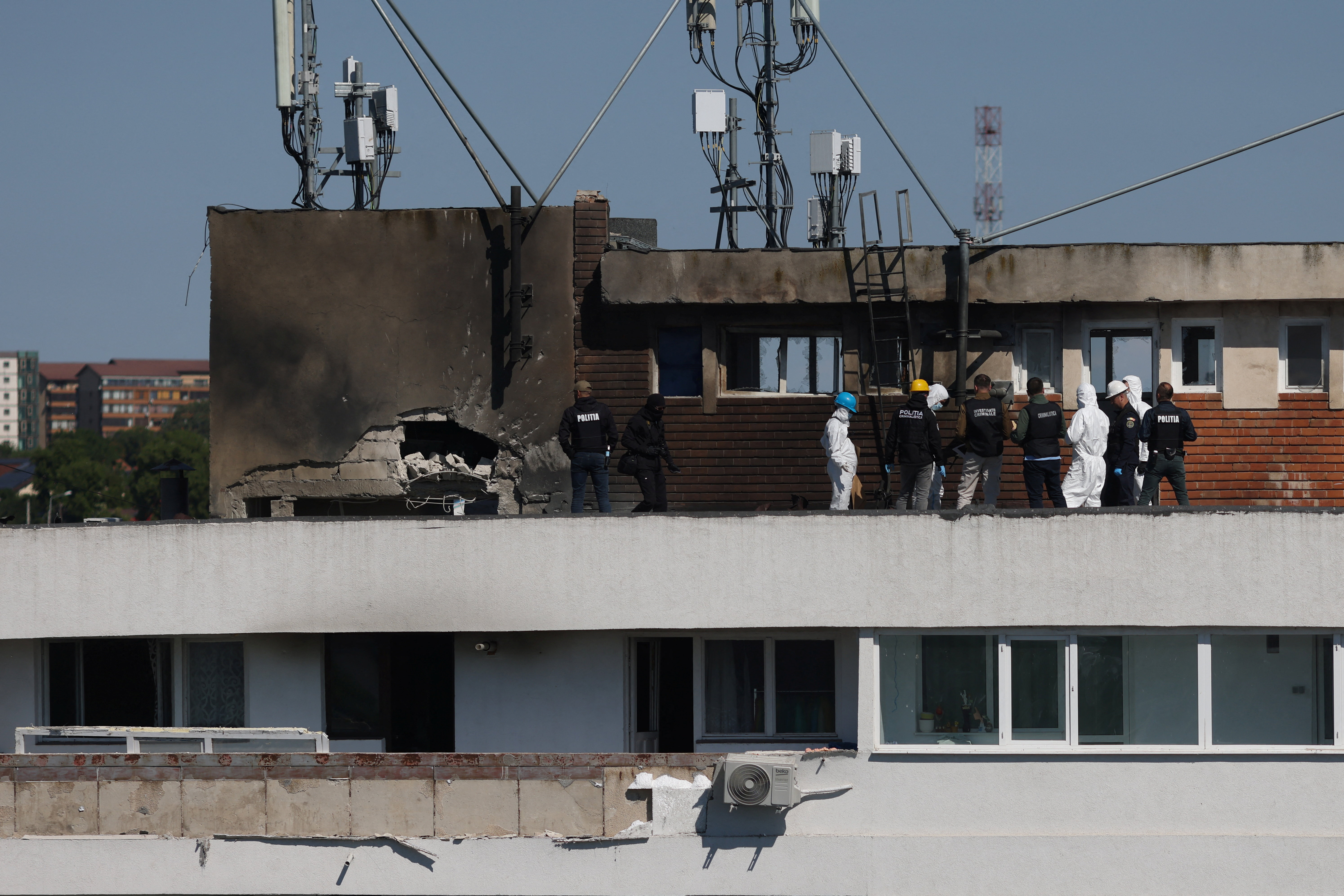 cover Romania says Russian drone hit apartment block, Nato vows to defend alliance territory