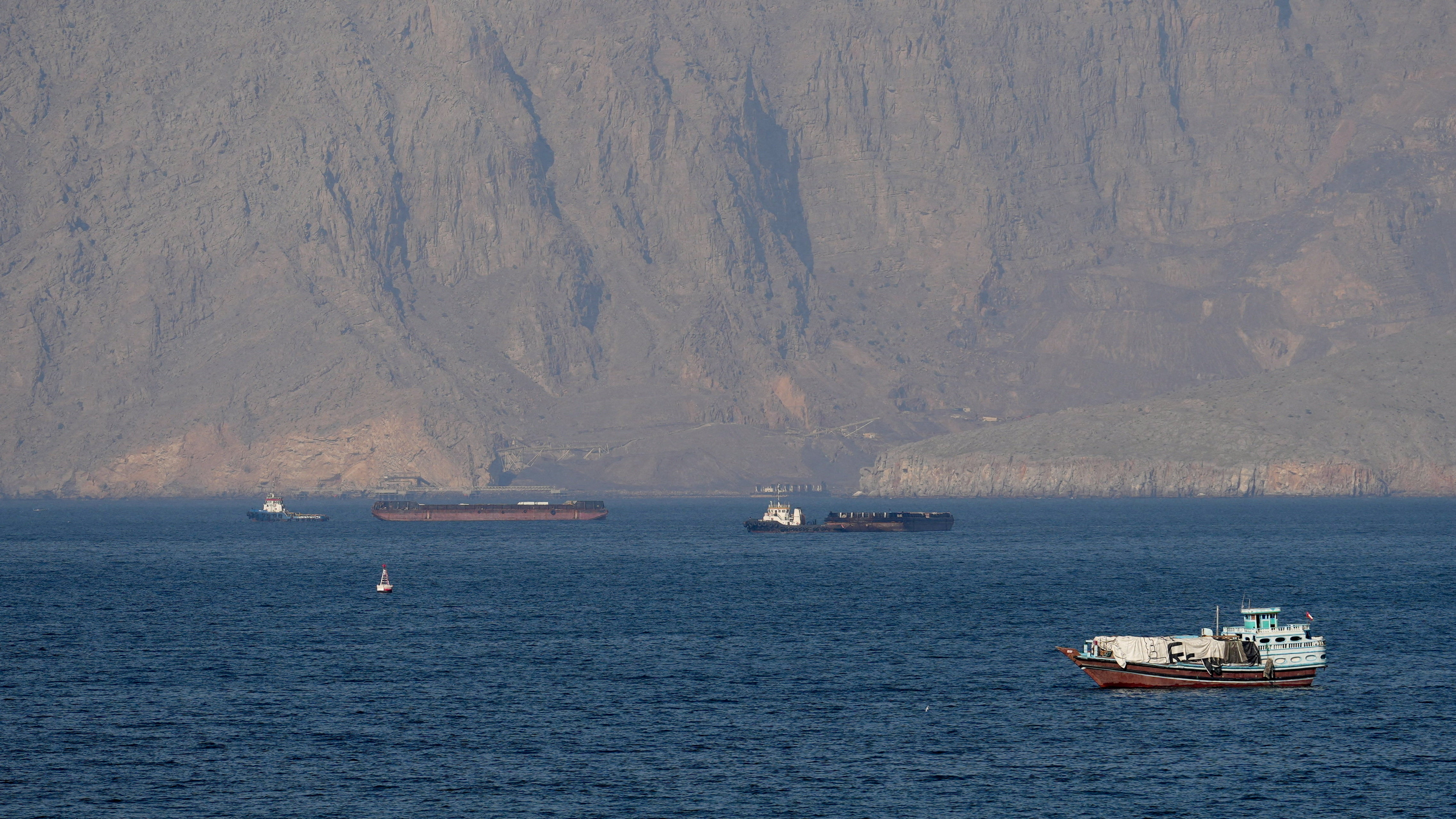 image Iran warns US Navy to stay clear of Hormuz after Trump says US to help stranded ships