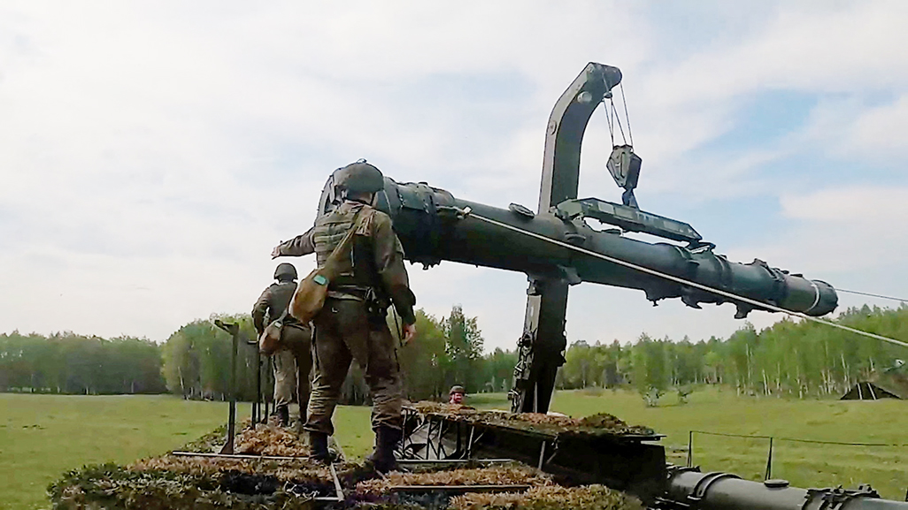 cover Russia says troops deliver nuclear warheads in major exercise