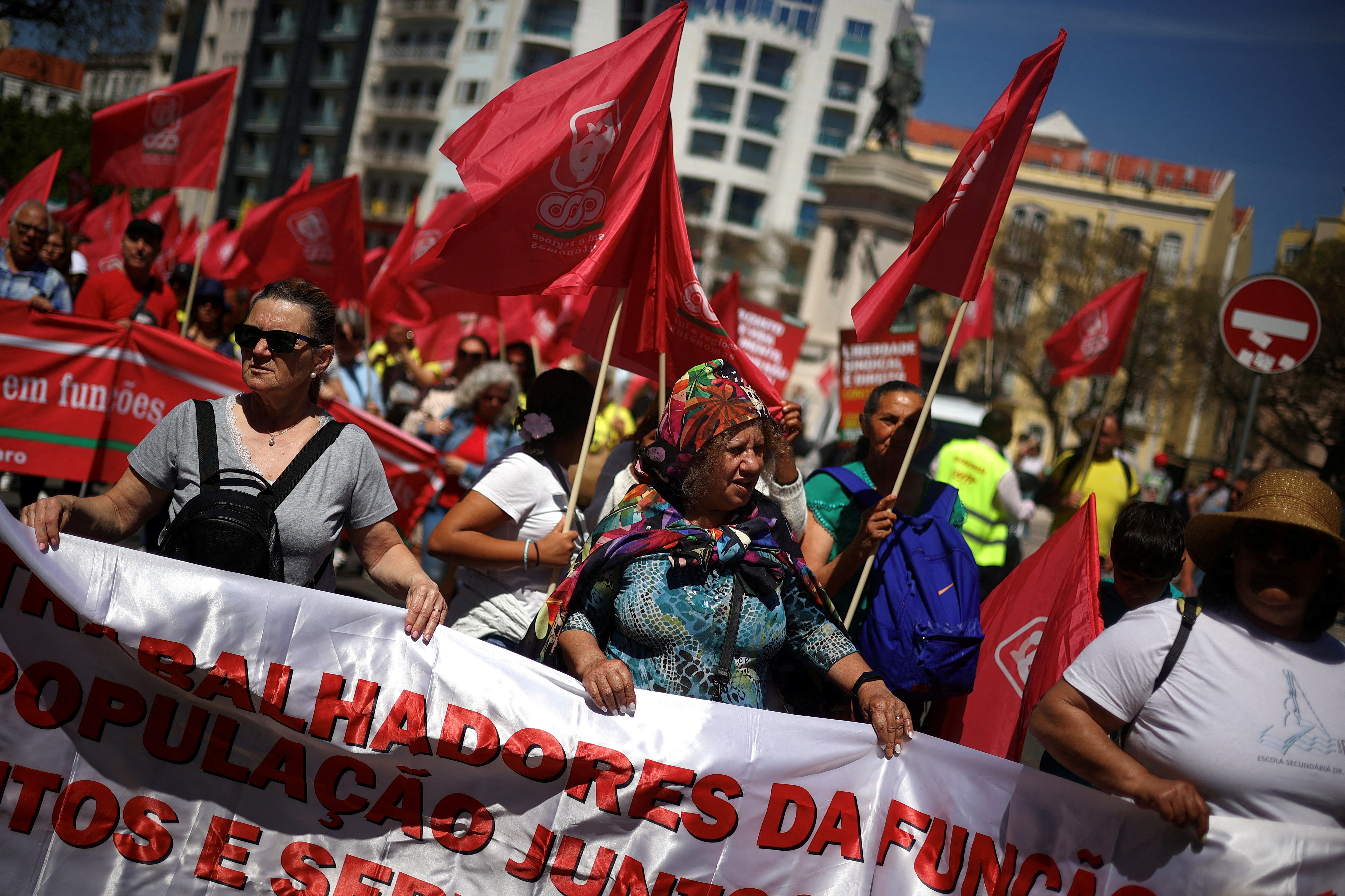 Portugal general strike disrupts trains, flights and schools over labour reforms