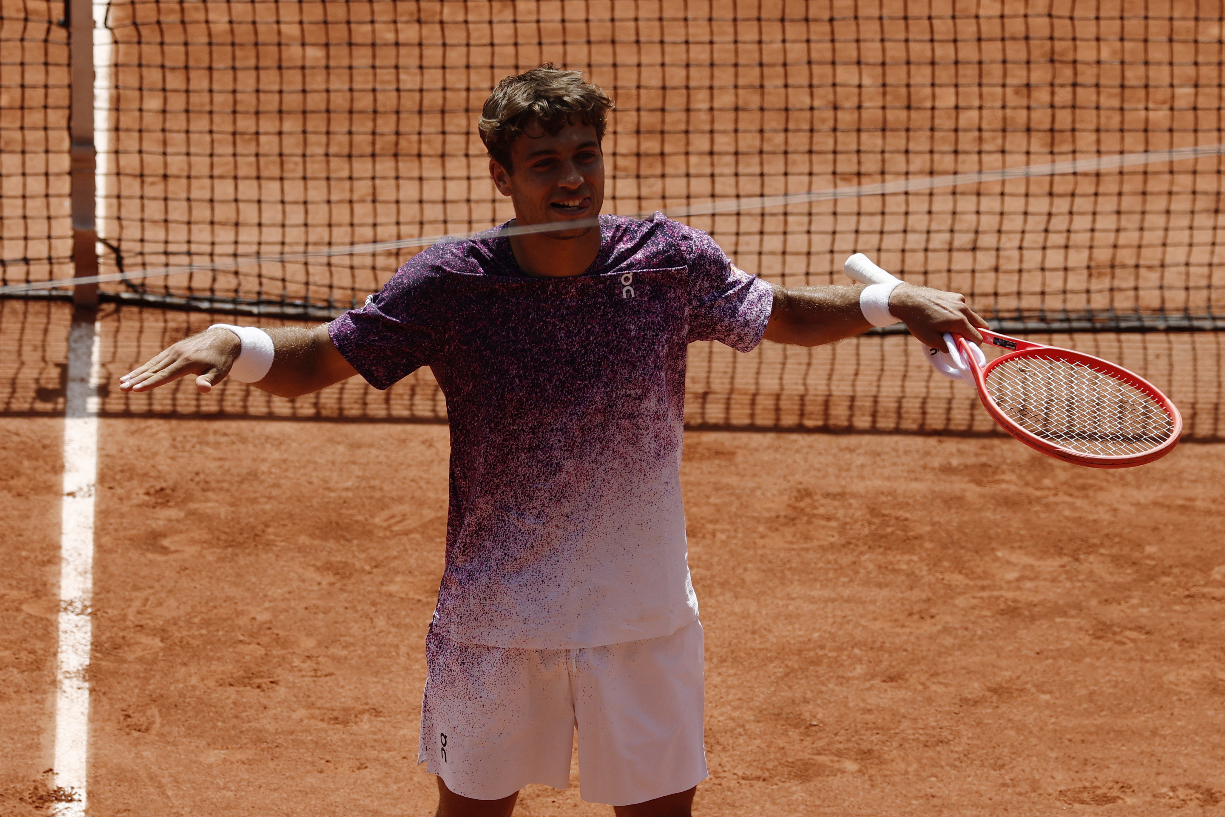 cover Cobolli drops set but battles past unseeded Svajda to reach French Open last eight