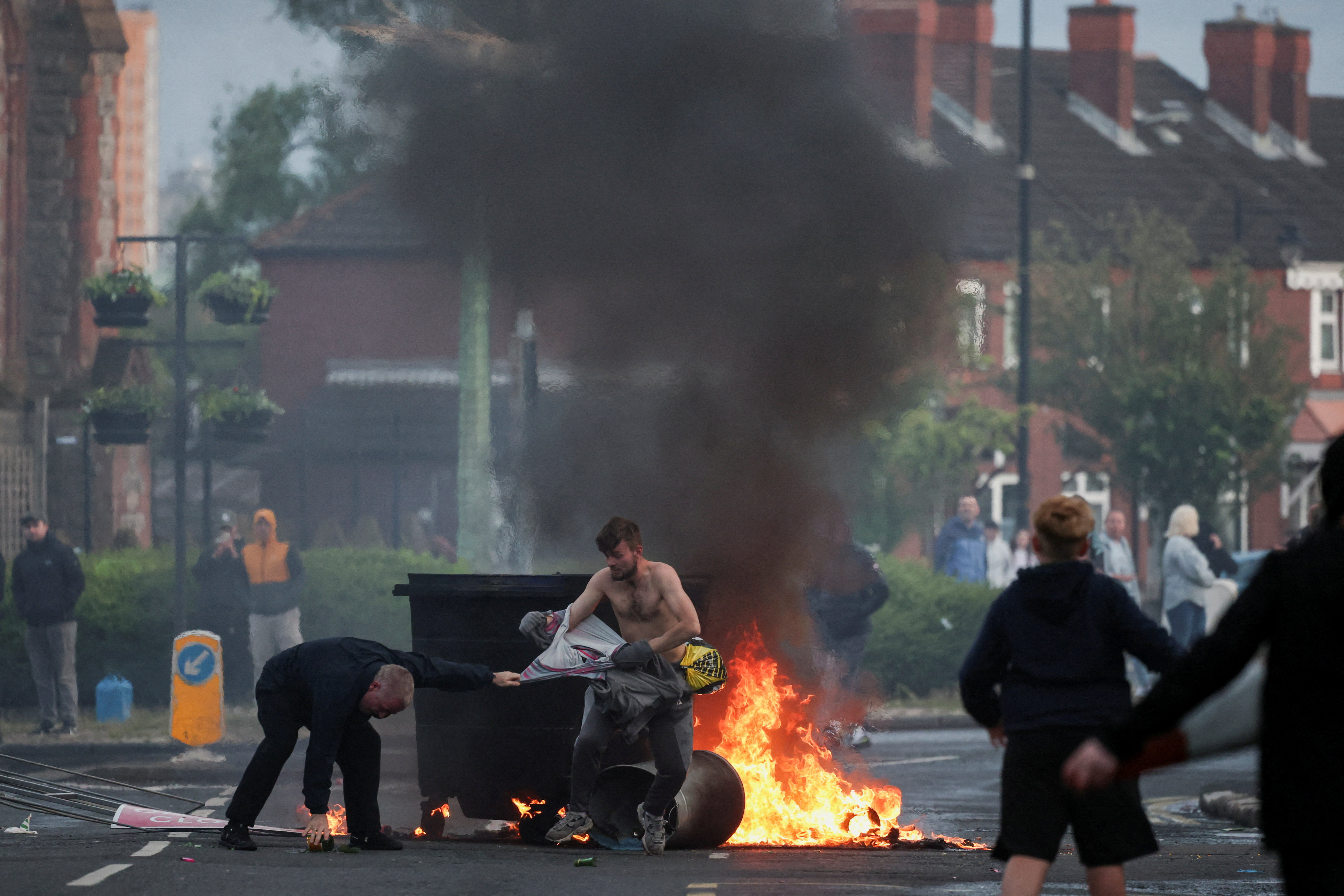 Belfast knife attack sparks anti-immigrant protests, vehicle
