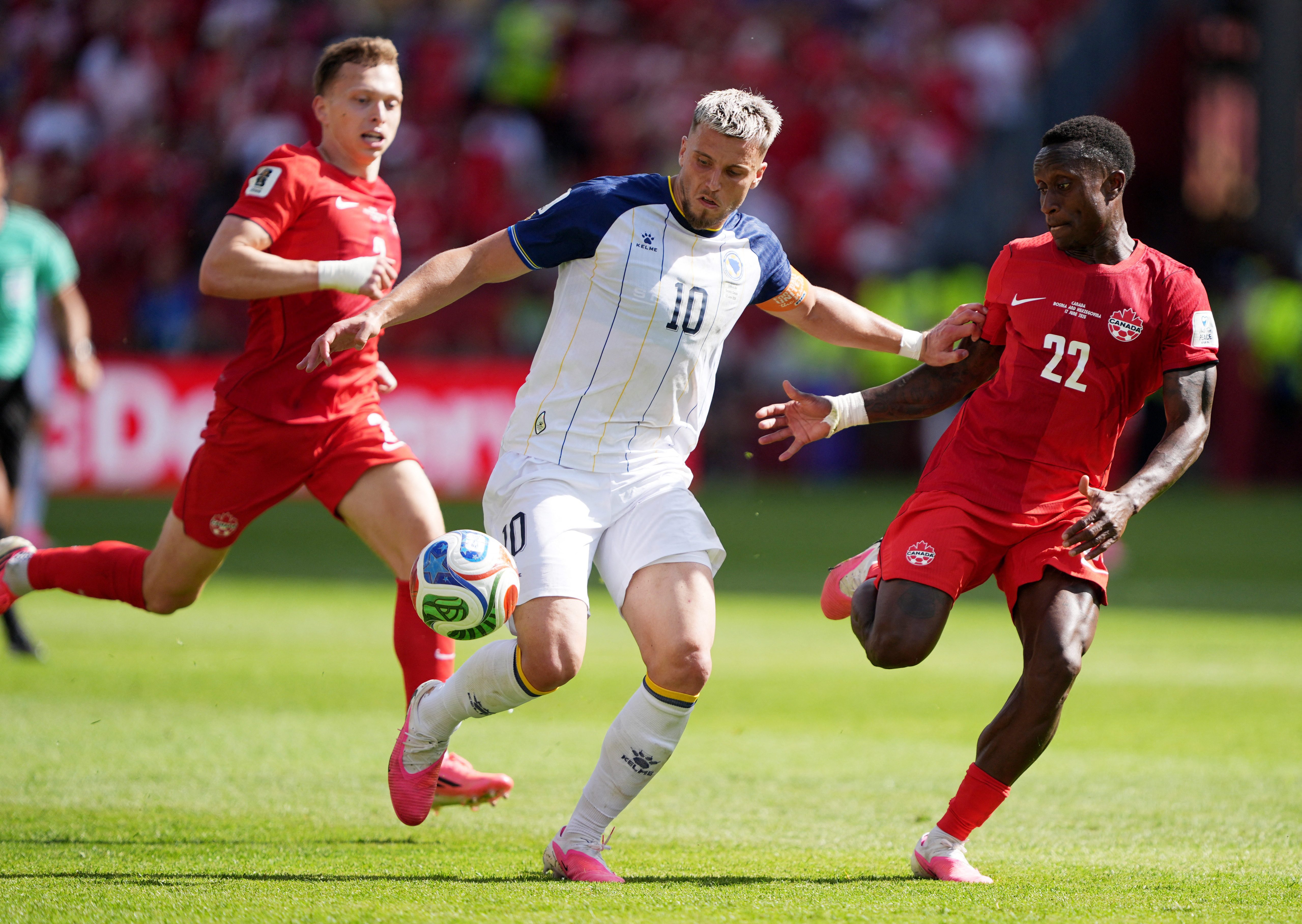 cover Canada&#8217;s Larin rescues late draw against Bosnia in Group B opener