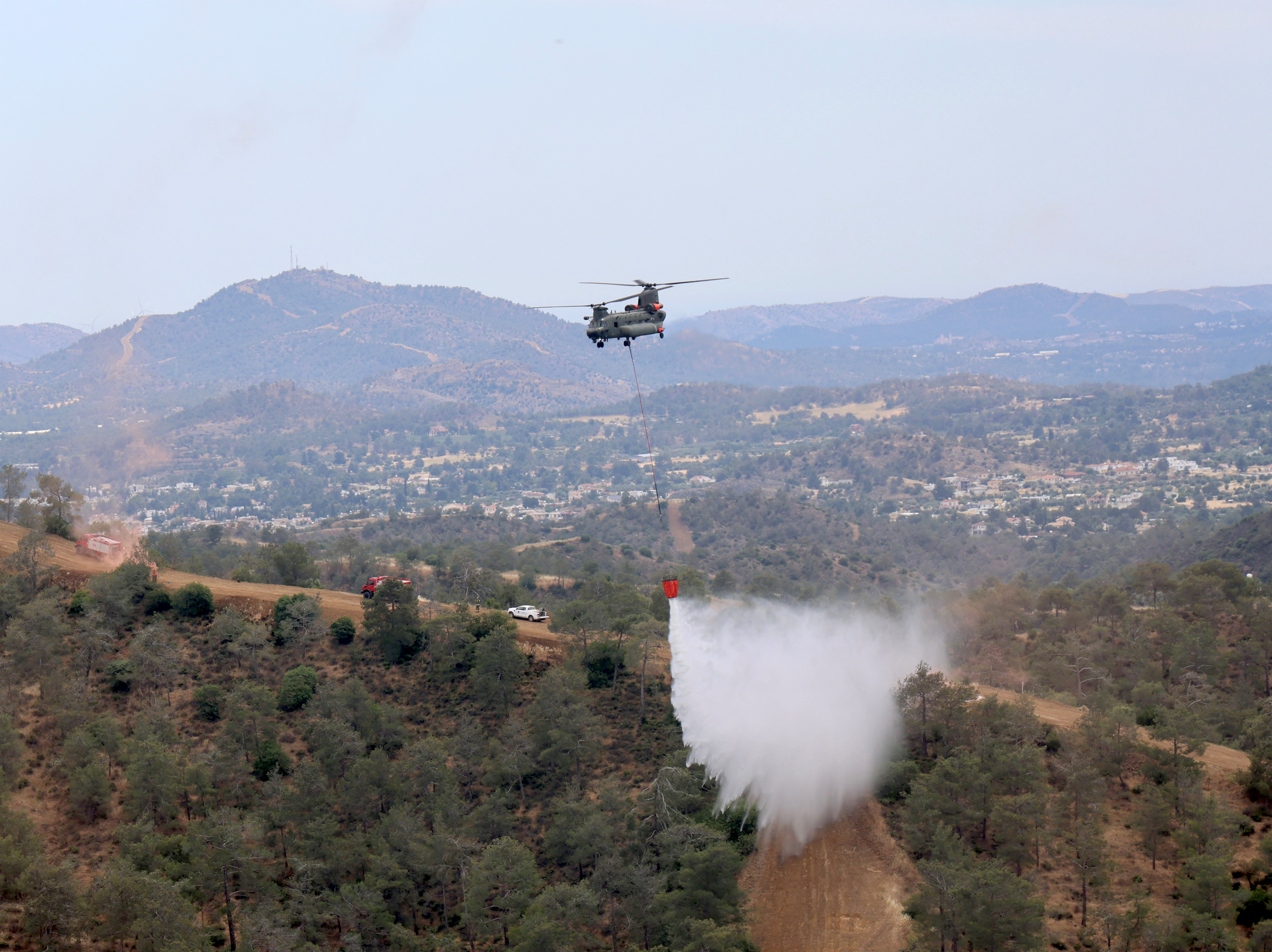 cover Chinook helicopters ready at British bases for firefighting 