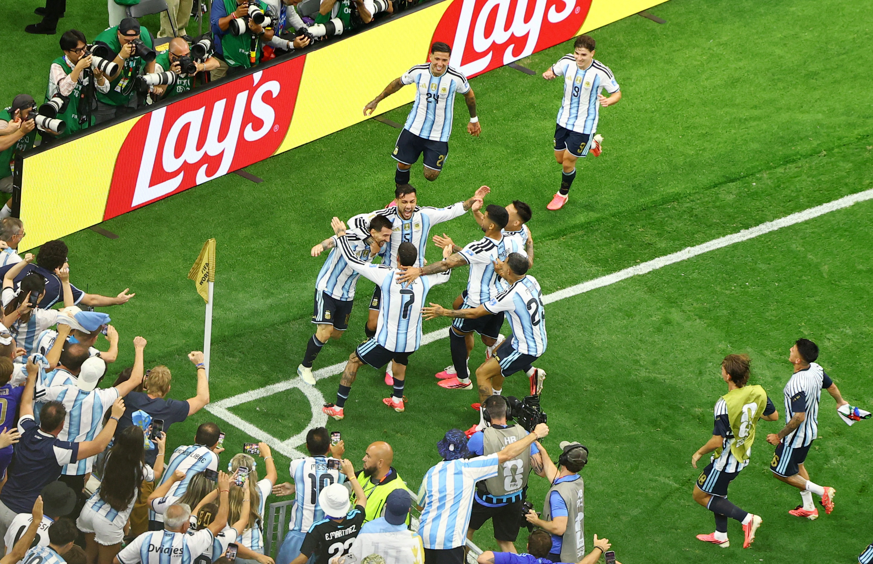 cover Soccer-Milestone Messi sends Argentina to World Cup knockout stage