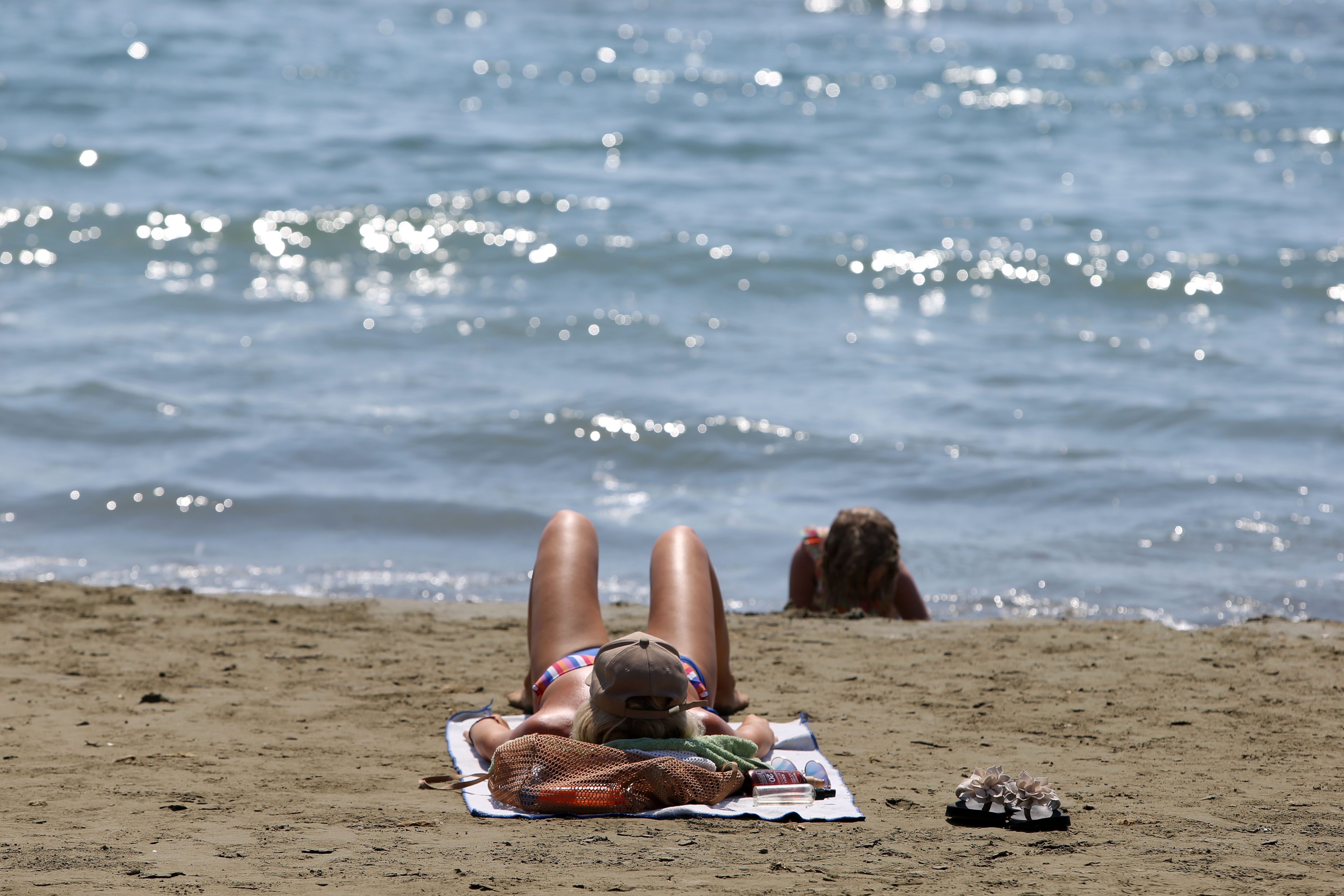 cover Warm sunny day, rain possible in mountains