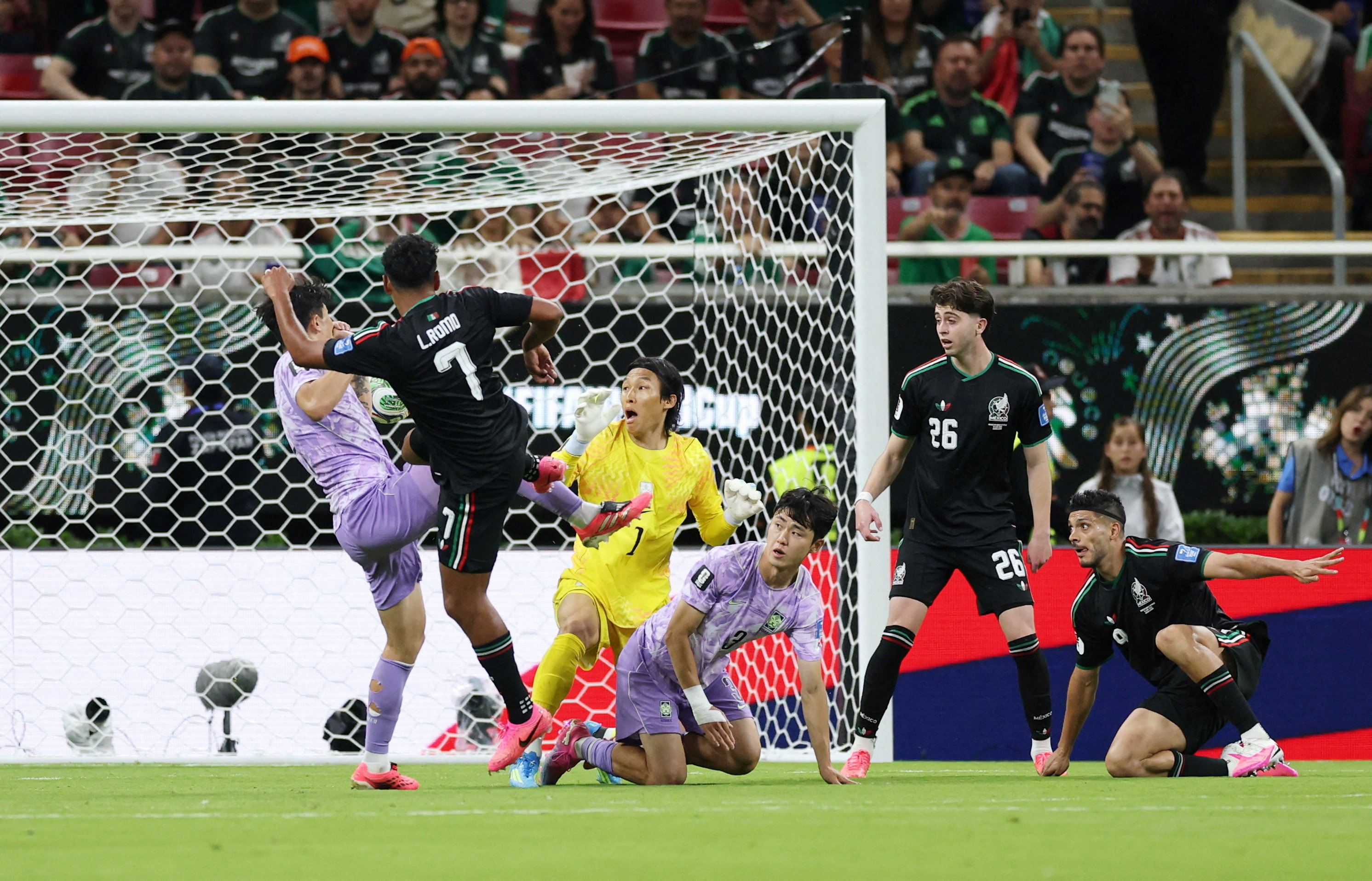 cover Group A: Romo&#8217;s goal sends Mexico through but blunt attack leaves questions
