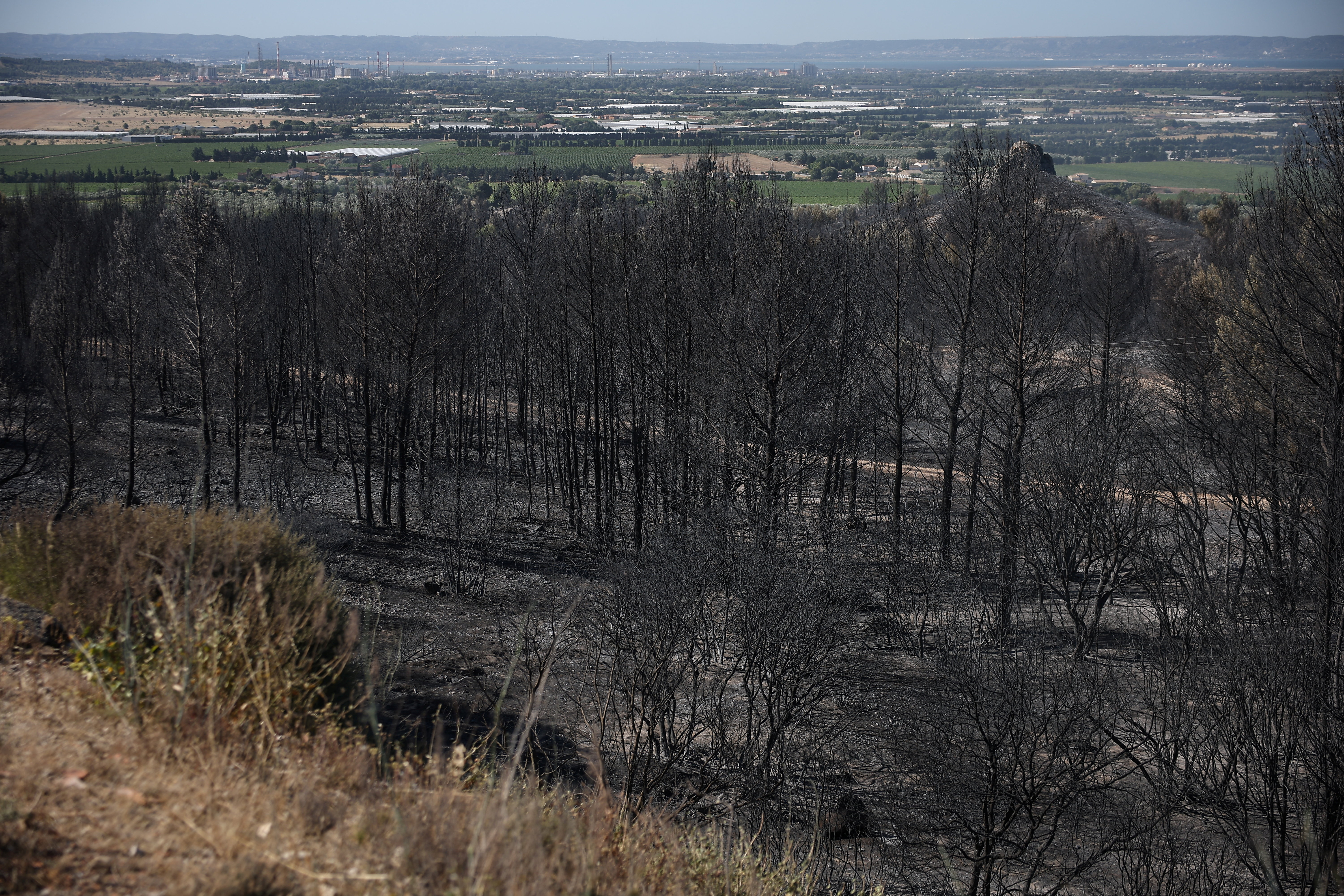 cover Firefighters battle blazes in southern France after European heatwave