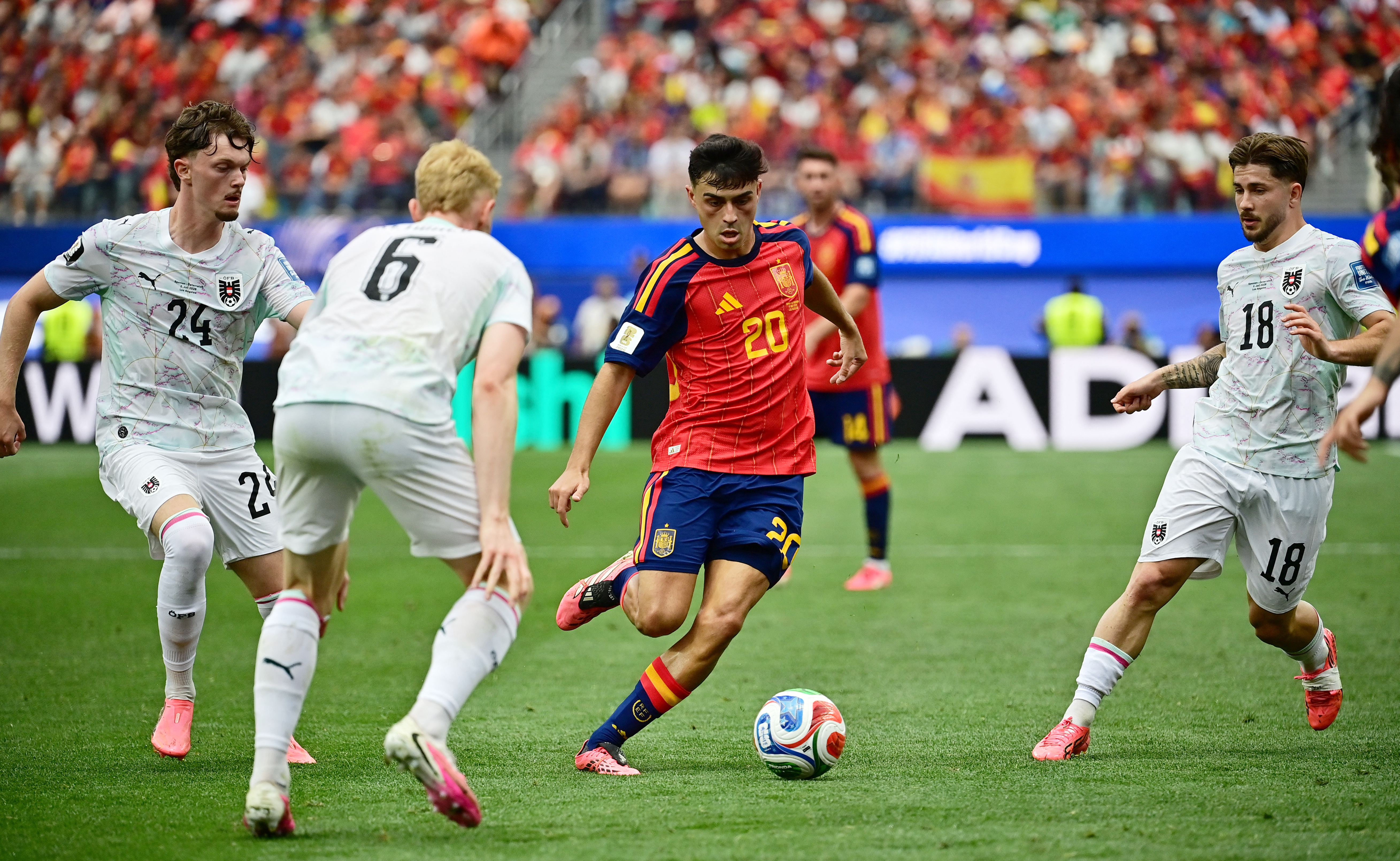 cover Improving Spain outclass Austria 3-0 to ease into World Cup last 16