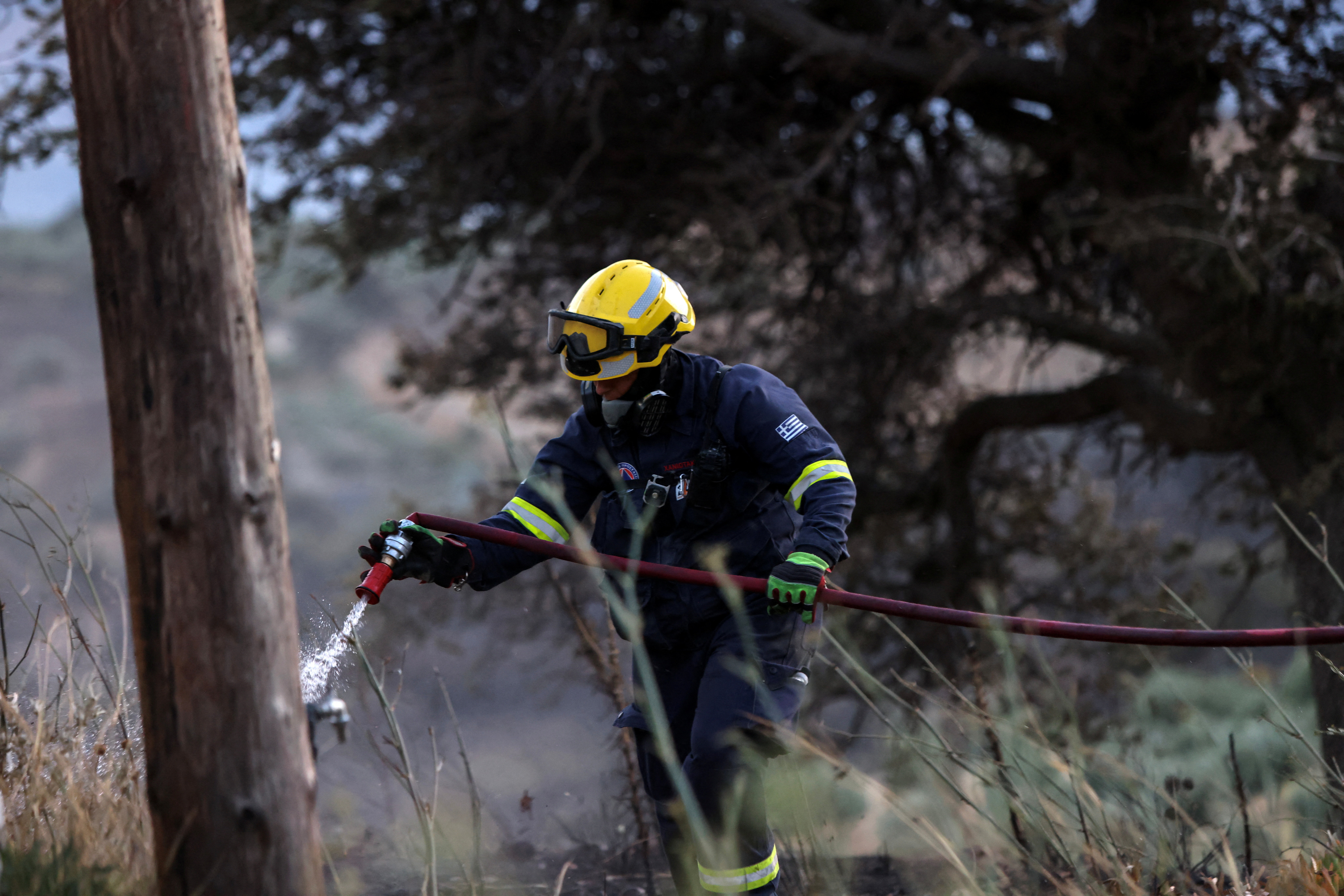 Three Greek firefighters die battling wildfires as evacuations and fires spread across southern Europe