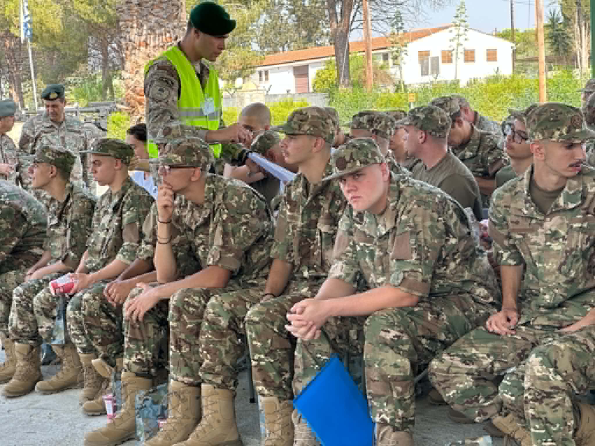 cover Defence minister welcomes new conscripts, assures families 