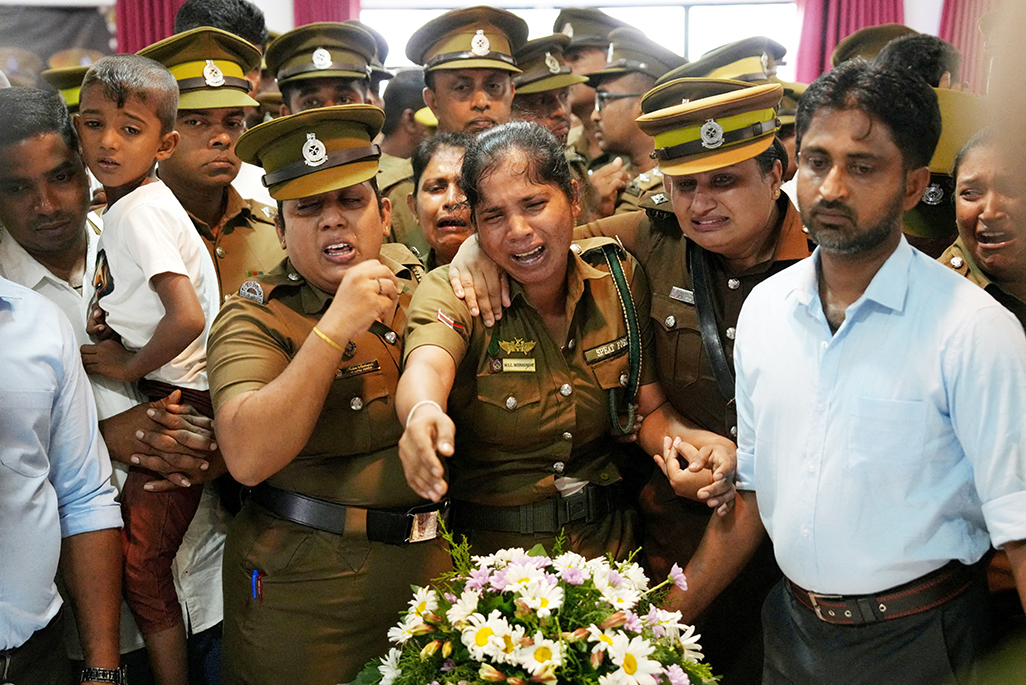image Families mourn 26 killed in deadly Sri Lanka prison riot