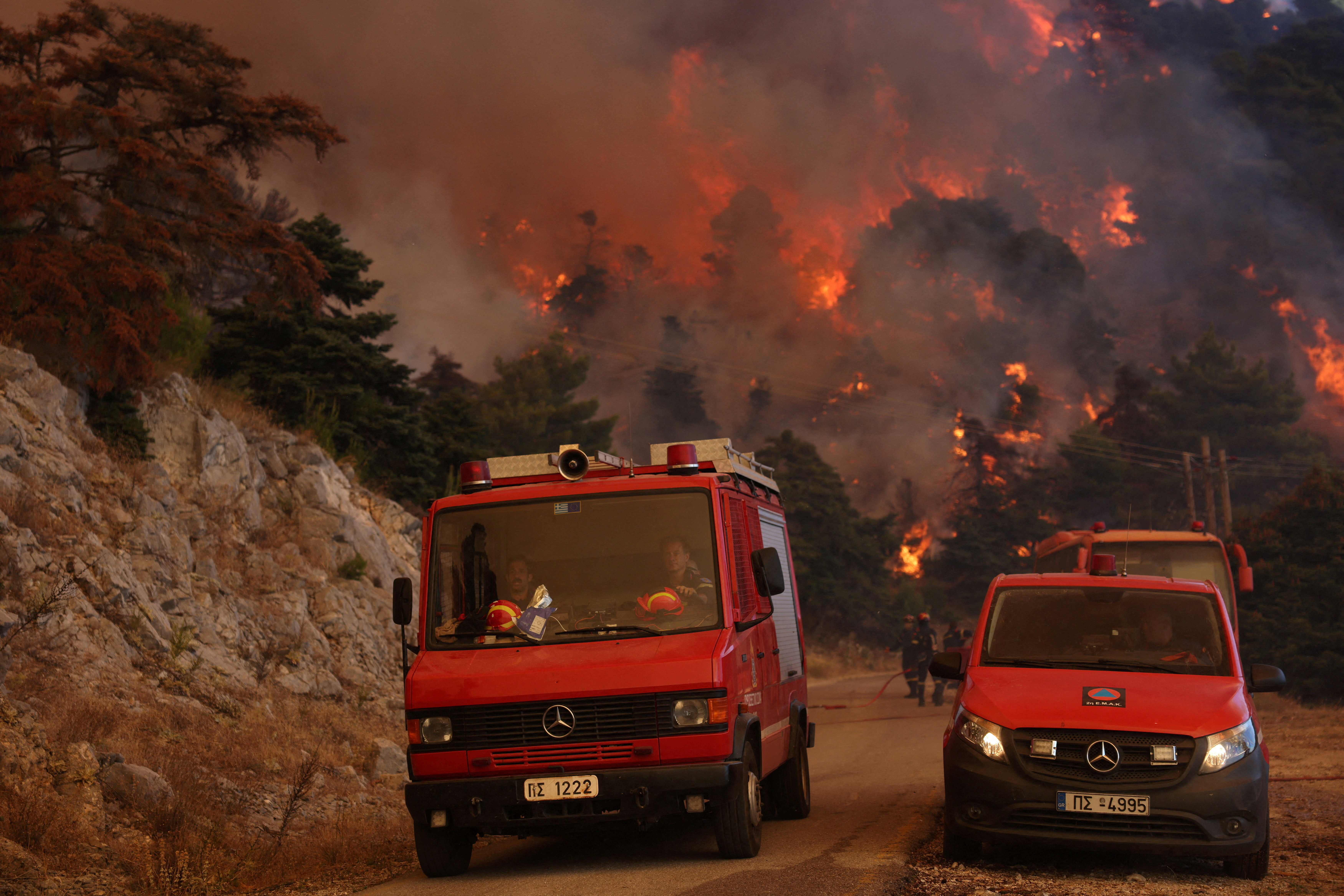 cover Greek crews fight wildfire northwest of Athens for fourth day