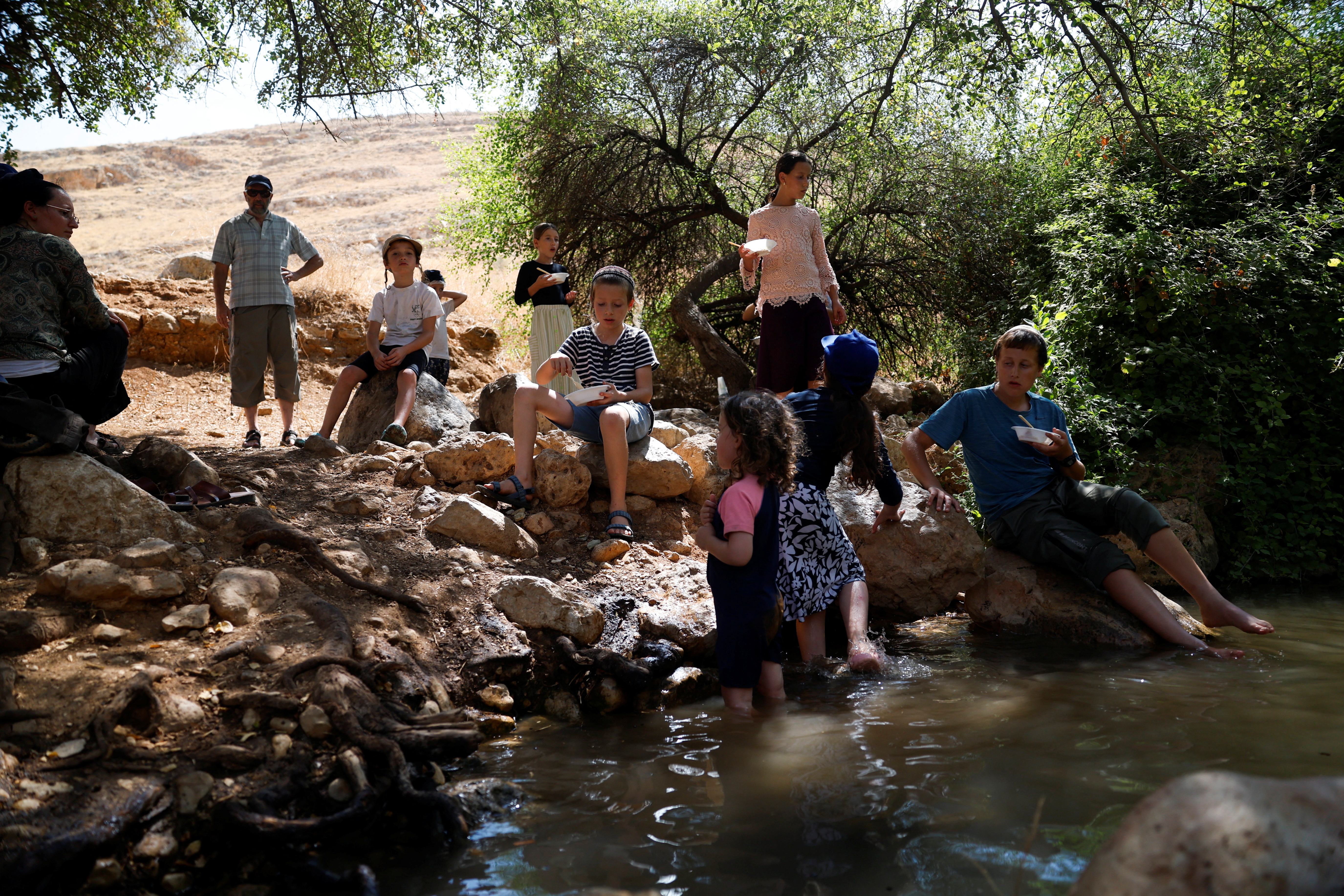 cover Israeli settlers divert Palestinian water to fill West Bank pool