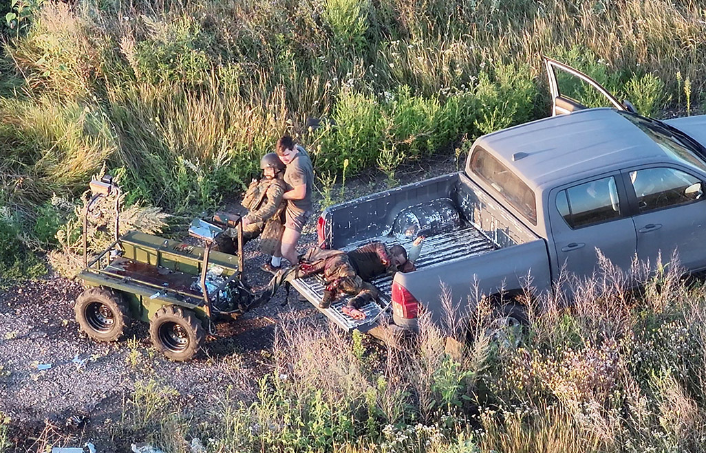 cover Ukrainian commander sped through the &#8216;kill zone&#8217; to save wounded troops