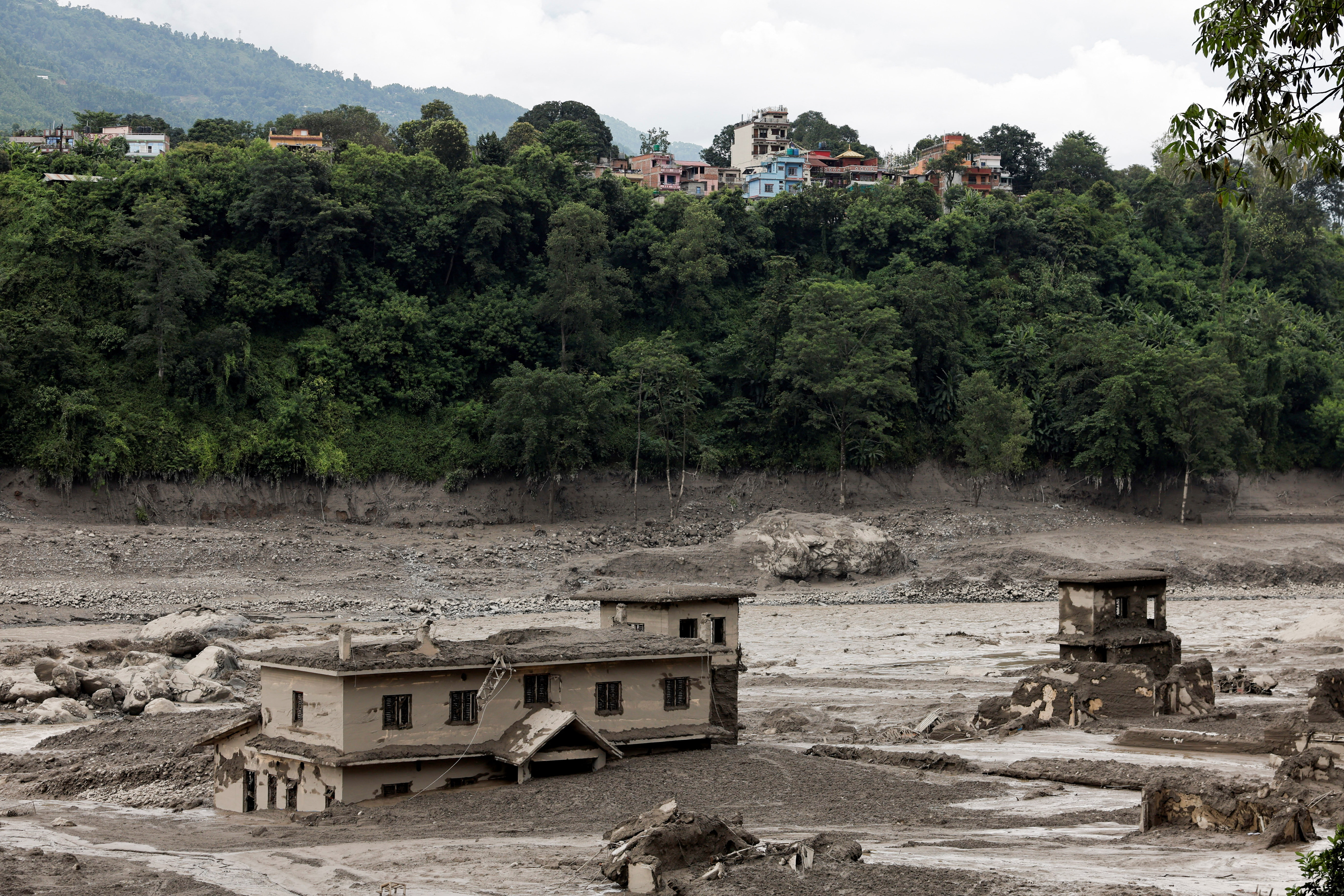 image Glacier collapse may have triggered deadly Nepal flash flood, experts say
