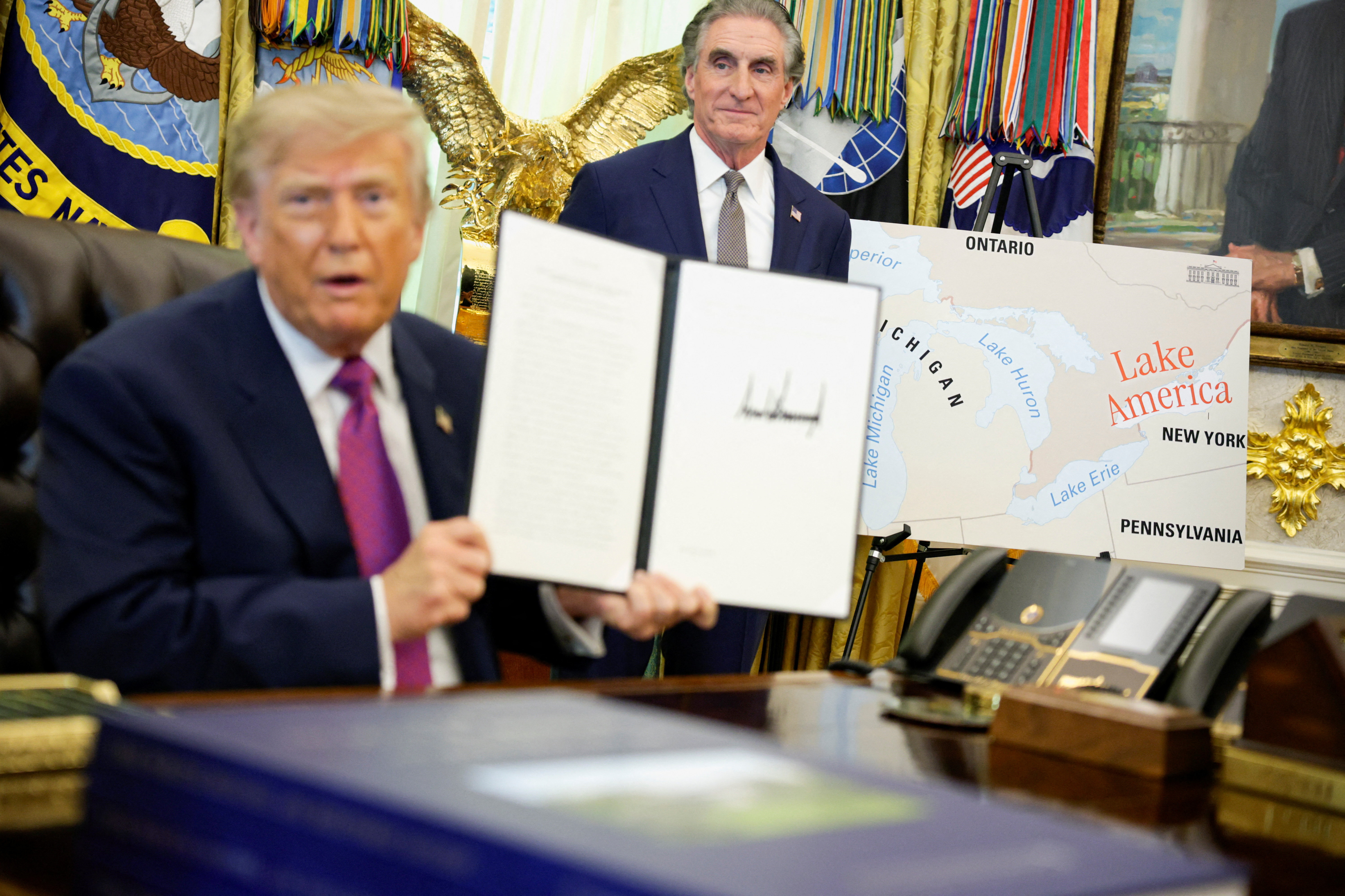 cover Trump signs order to rename Lake Ontario as Lake America