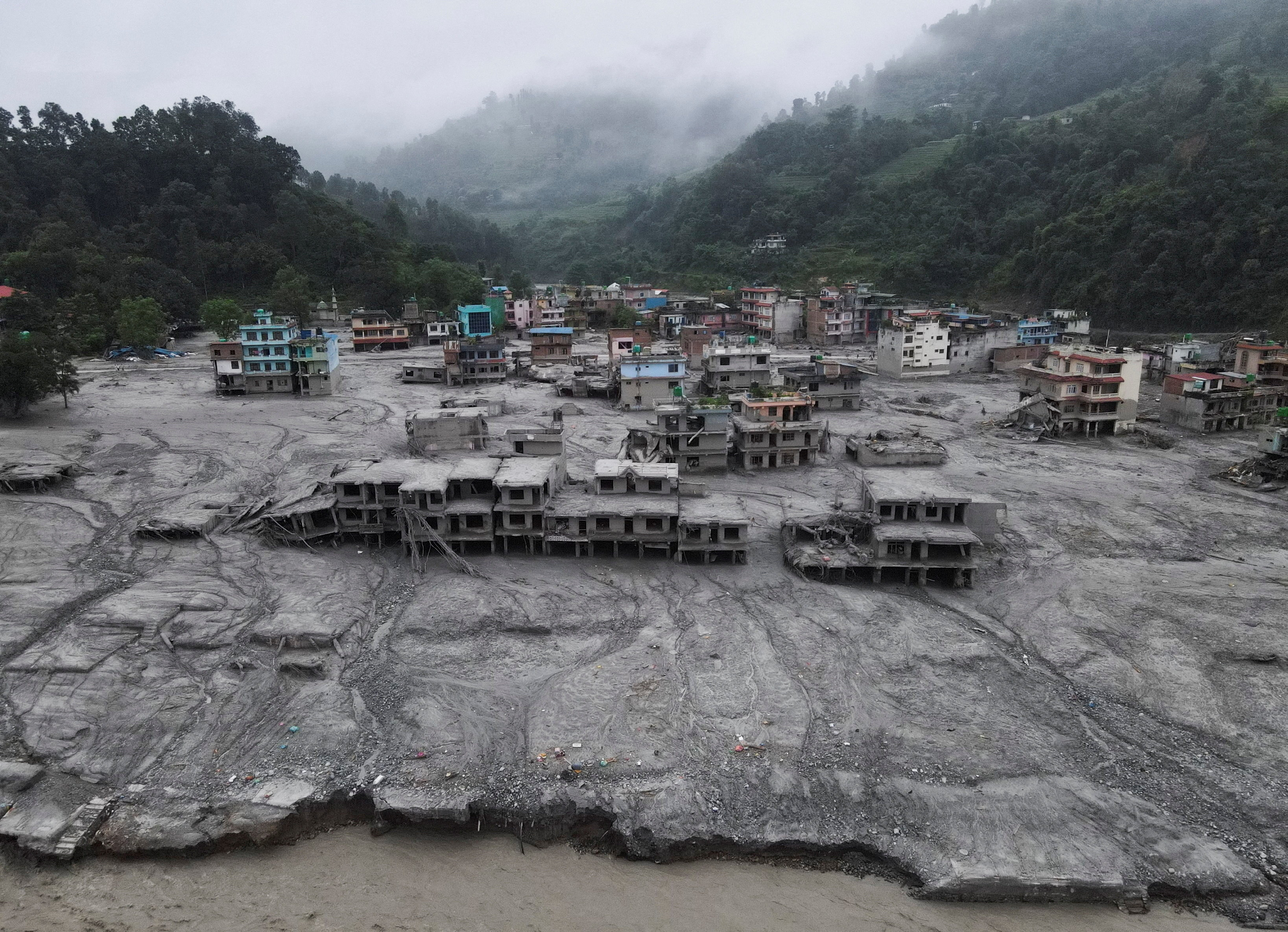 cover Nepal wants help for flood, billions of dollars as bad weather hampers rescue