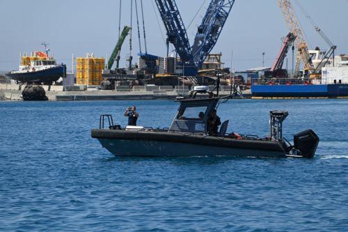 image Larnaca, Vasiliko and Latchi port plans on the table