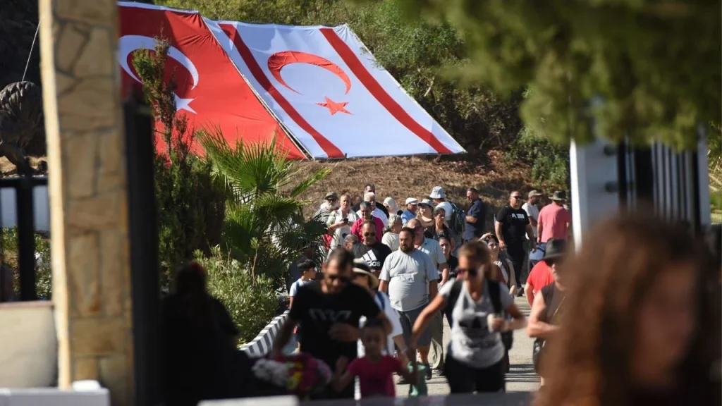 cover Turkish Cypriots cross to Kokkina for Tillyria bombing anniversary