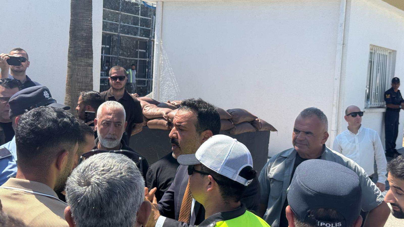 cover Turkish ambassador leaves port of Kyrenia to chorus of boos