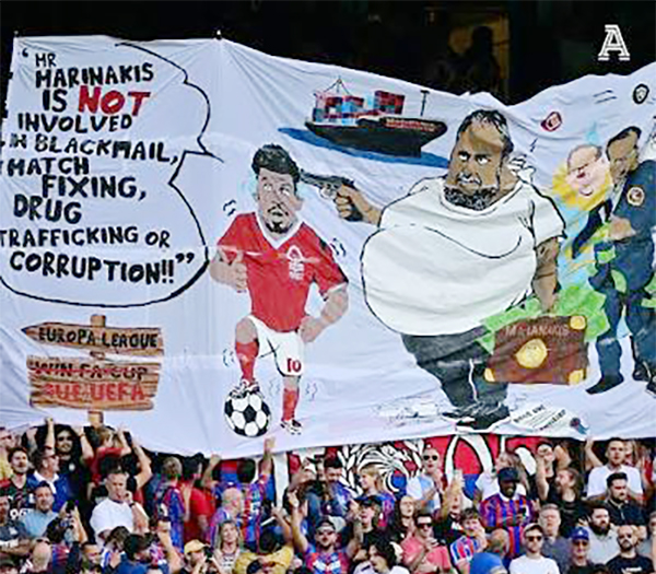 cover Forest owner Marinakis sues Crystal Palace after provocative fan banner