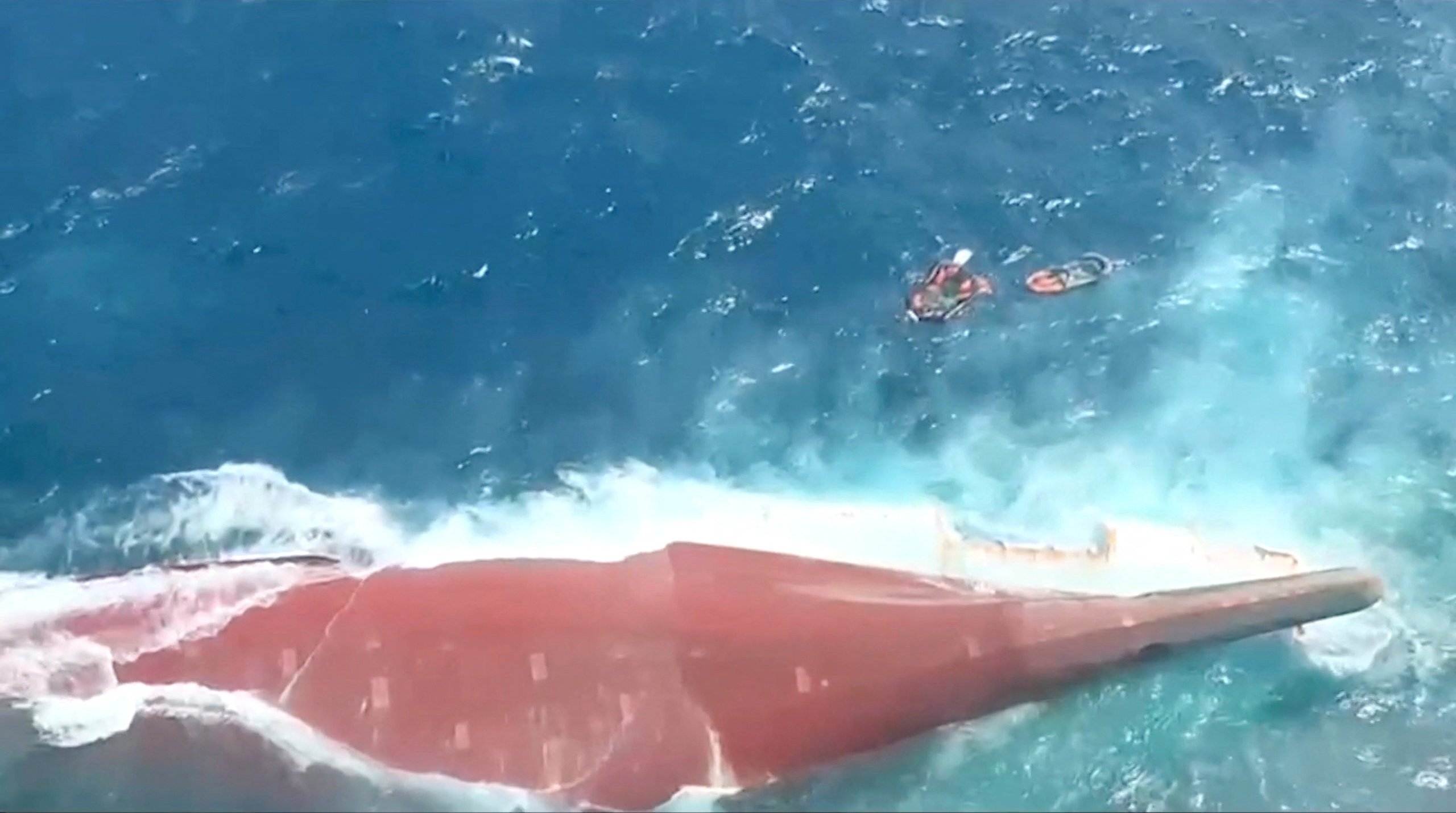 cover Indonesia rescuers battle turbulent seas in search for 129 people after passenger ship capsizes
