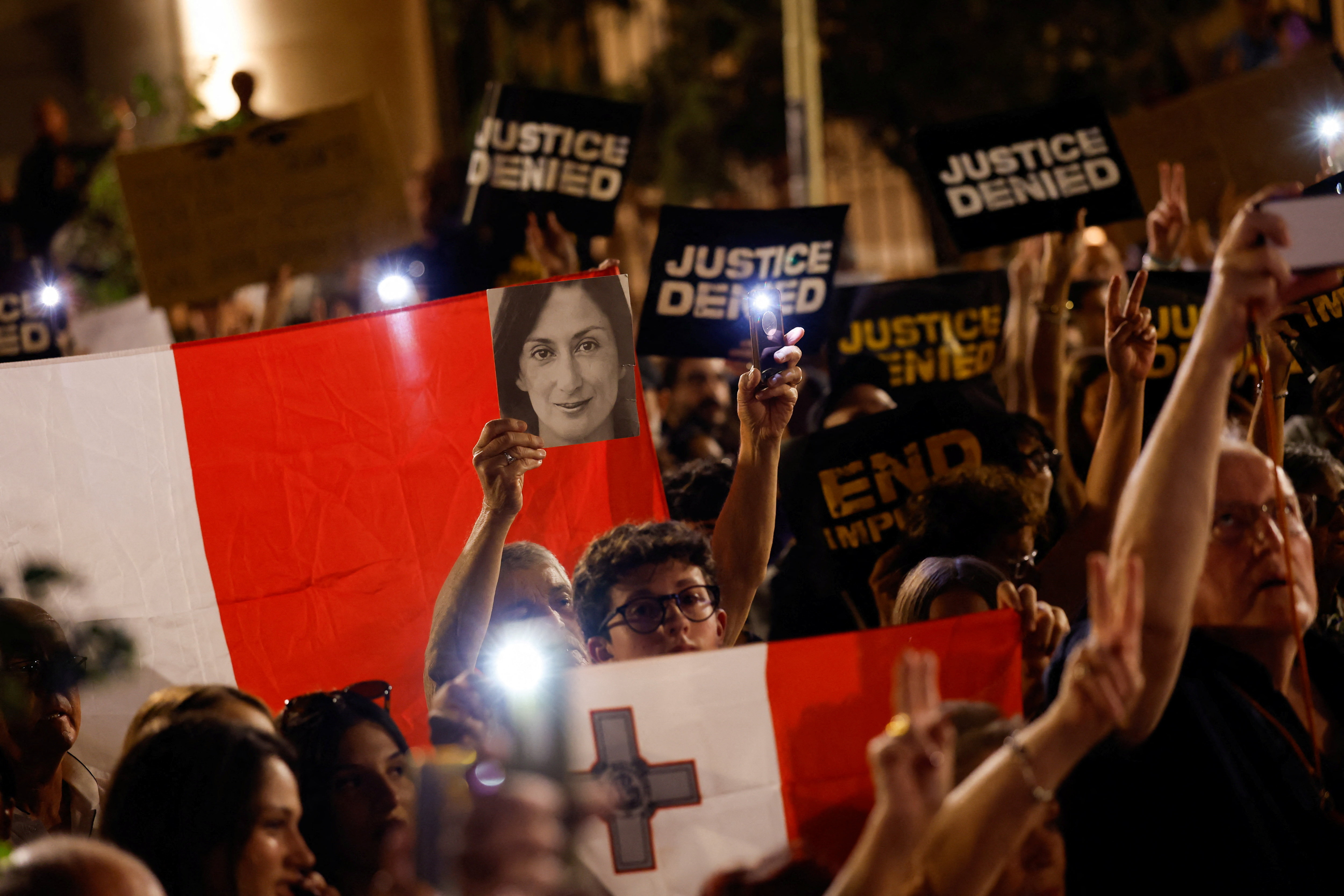 cover Large crowd demands justice for assassinated Malta journalist