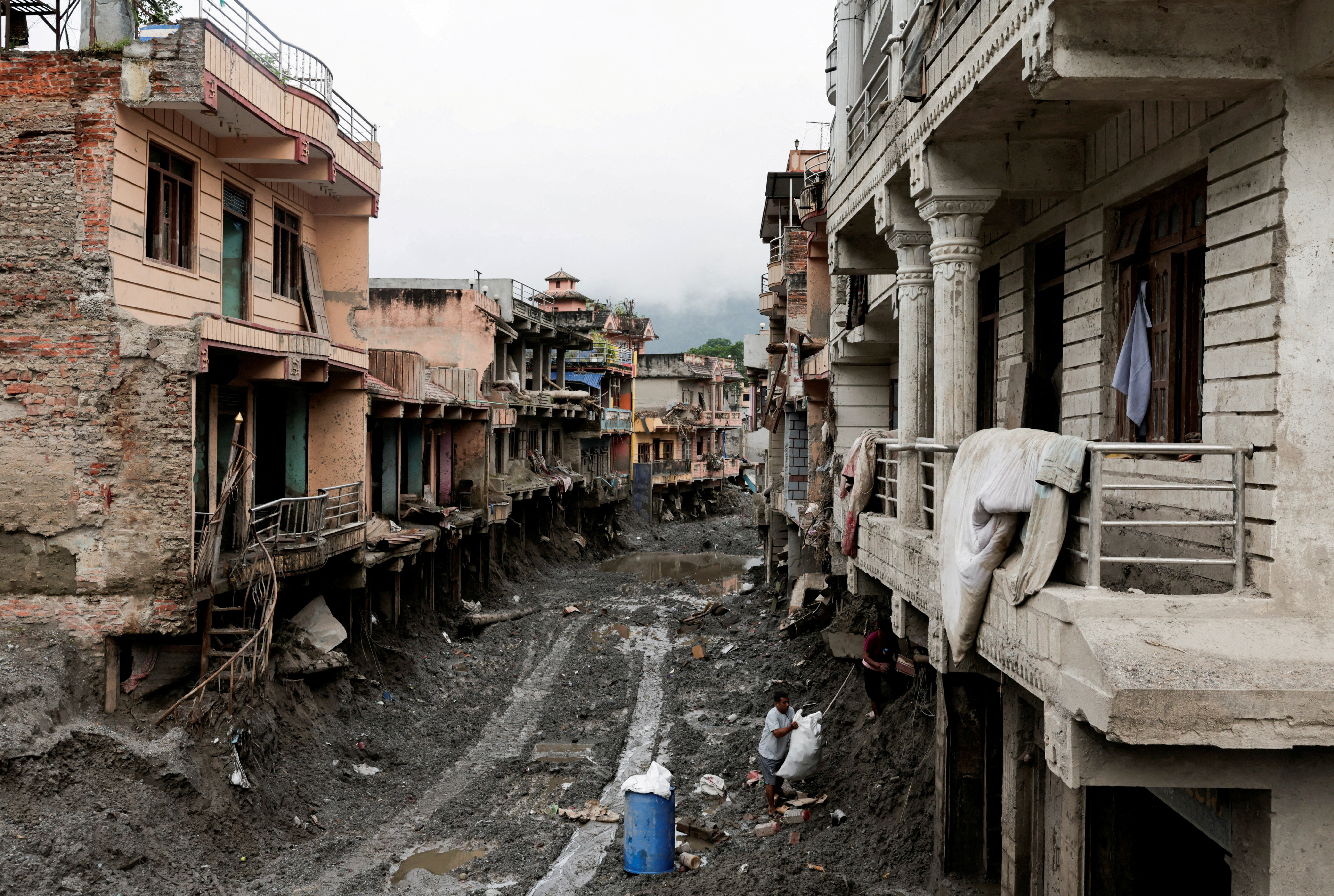 image Floods, landslides kill 56 in India and 14 in Nepal