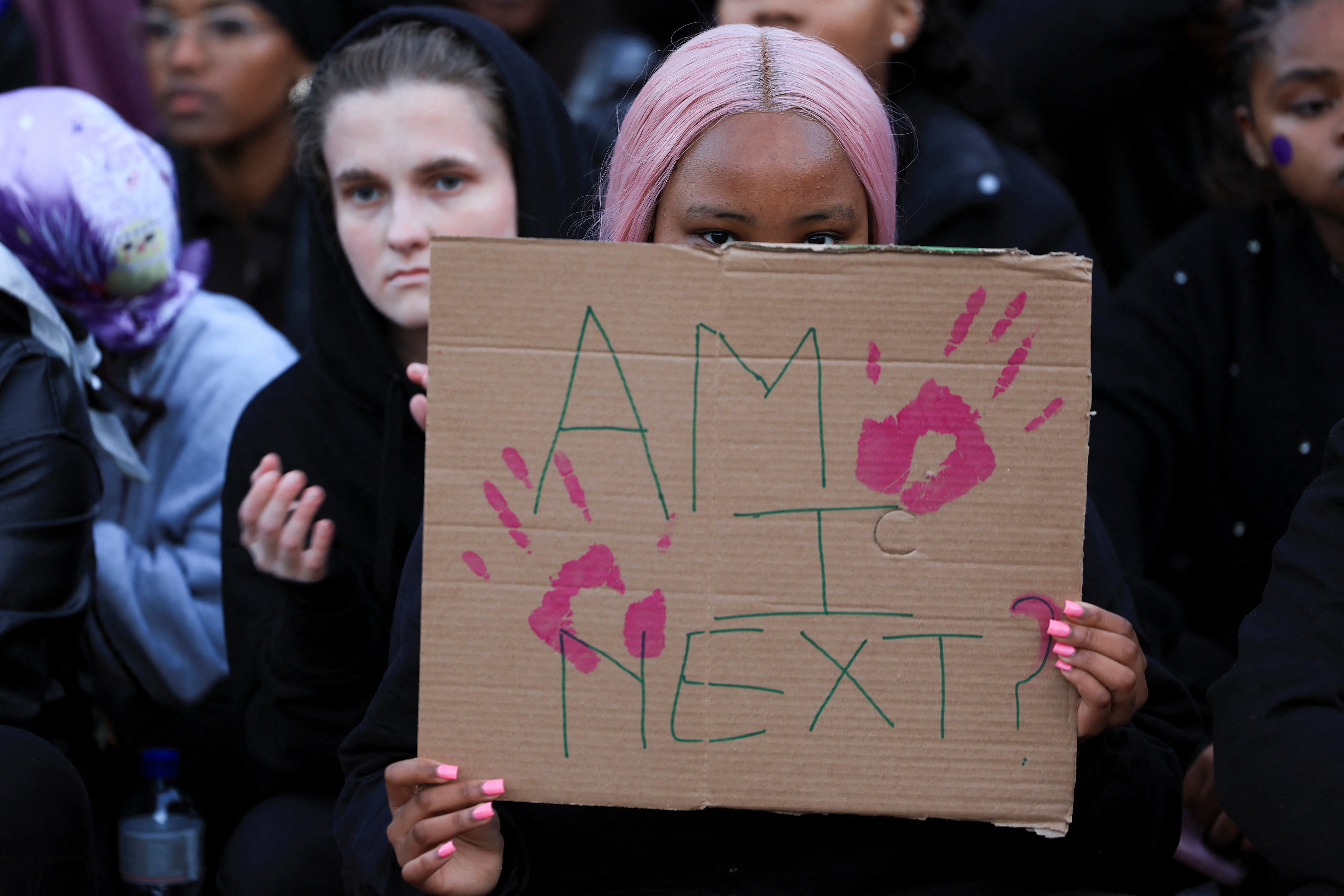 cover After deaths of nine women, South Africans gather to run, mourn and demand change