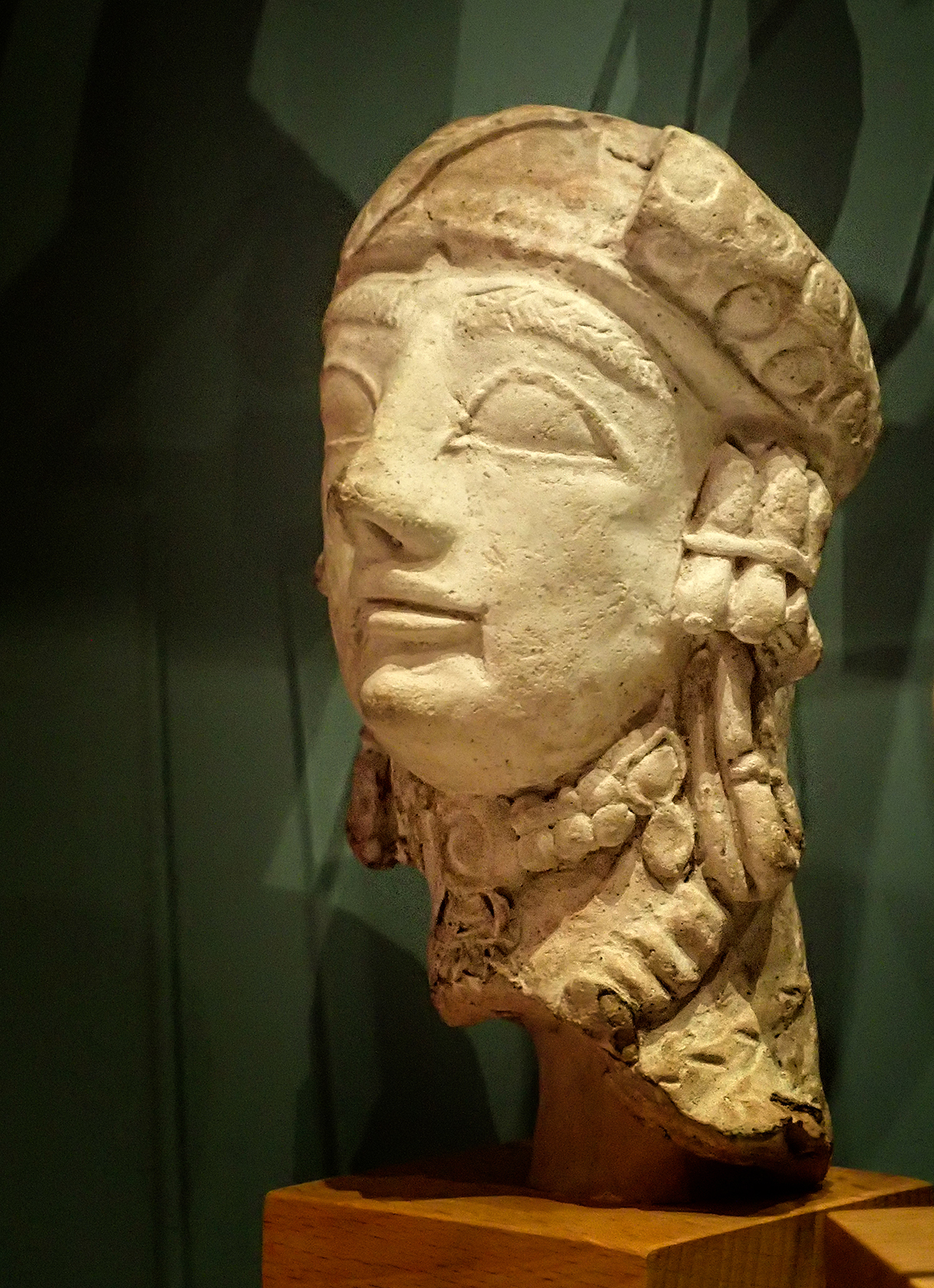 Funery scultpture of a Cypriot woman wearing jewellery 600 to 550 BC