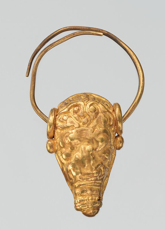 Gold earring with head of a bull