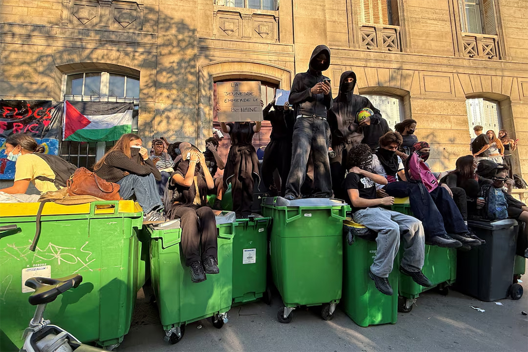 cover Student protests and French public sector strike heap pressure on Macron