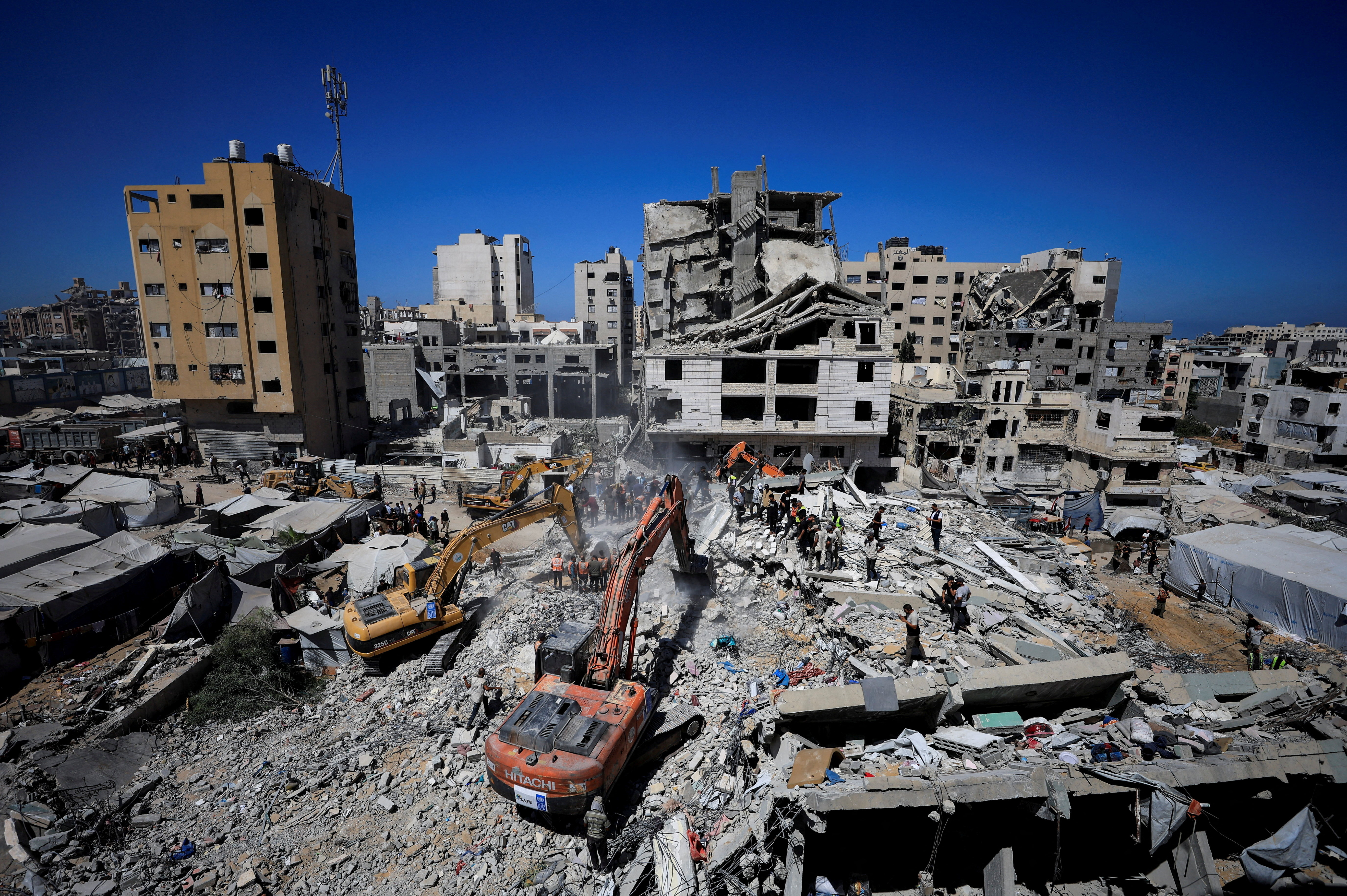 image Rescue efforts end after 21 die in collapse of bomb-damaged building in Gaza; 45 saved from rubble