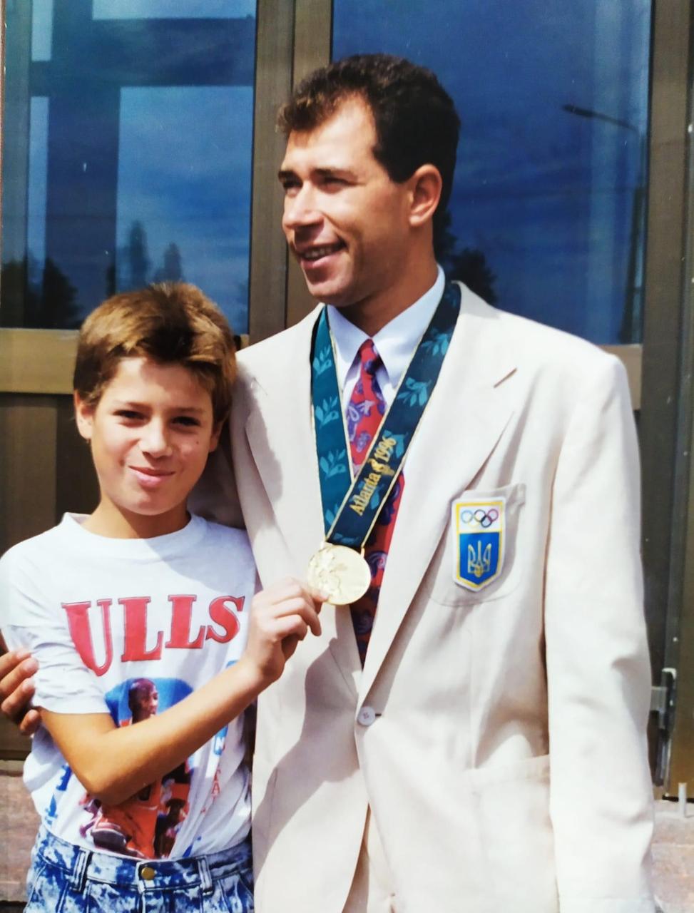 Ihor with his Olympic medal and a young fan