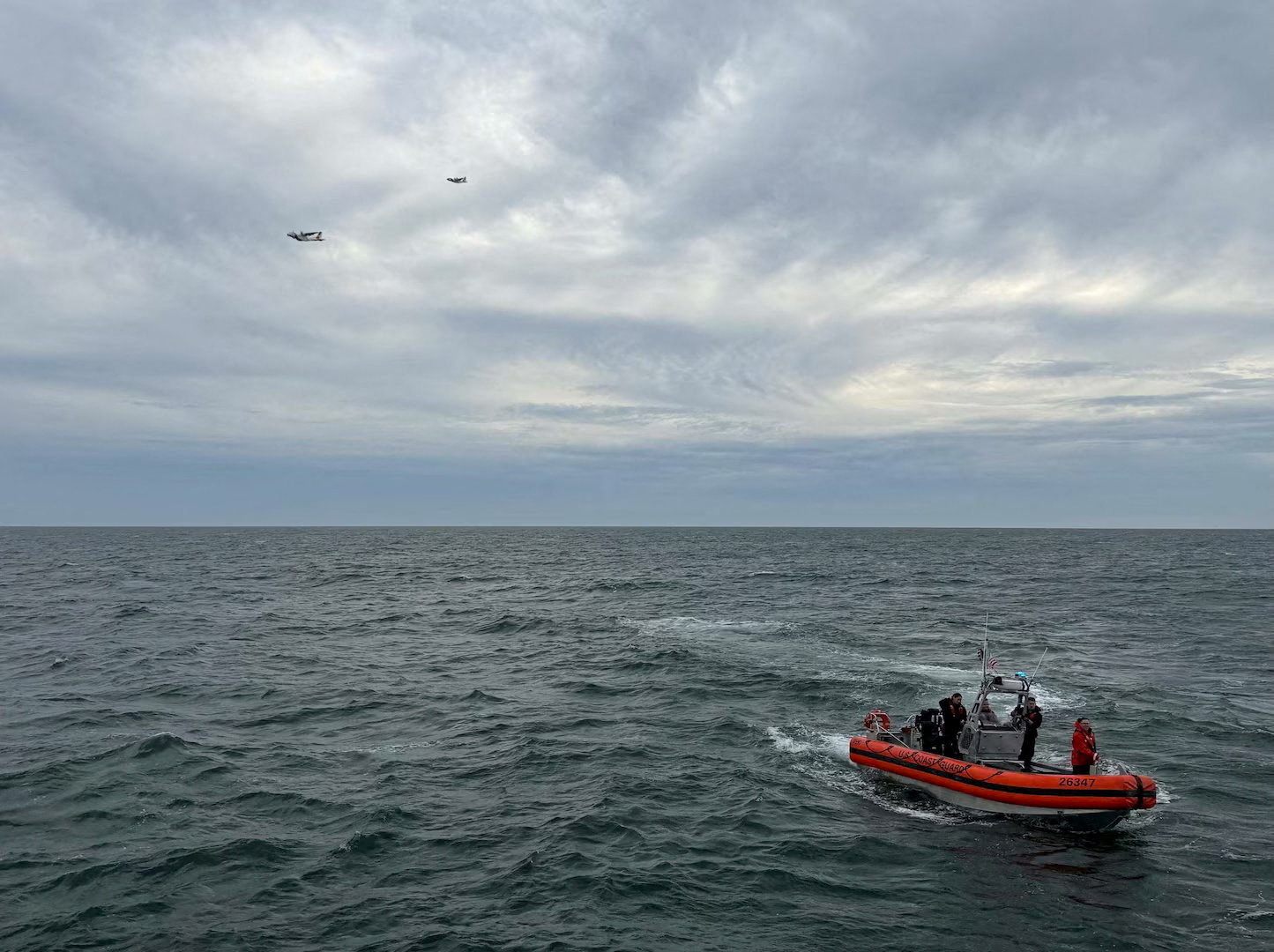 cover US Coast Guard suspends search for people on crashed medical aircraft