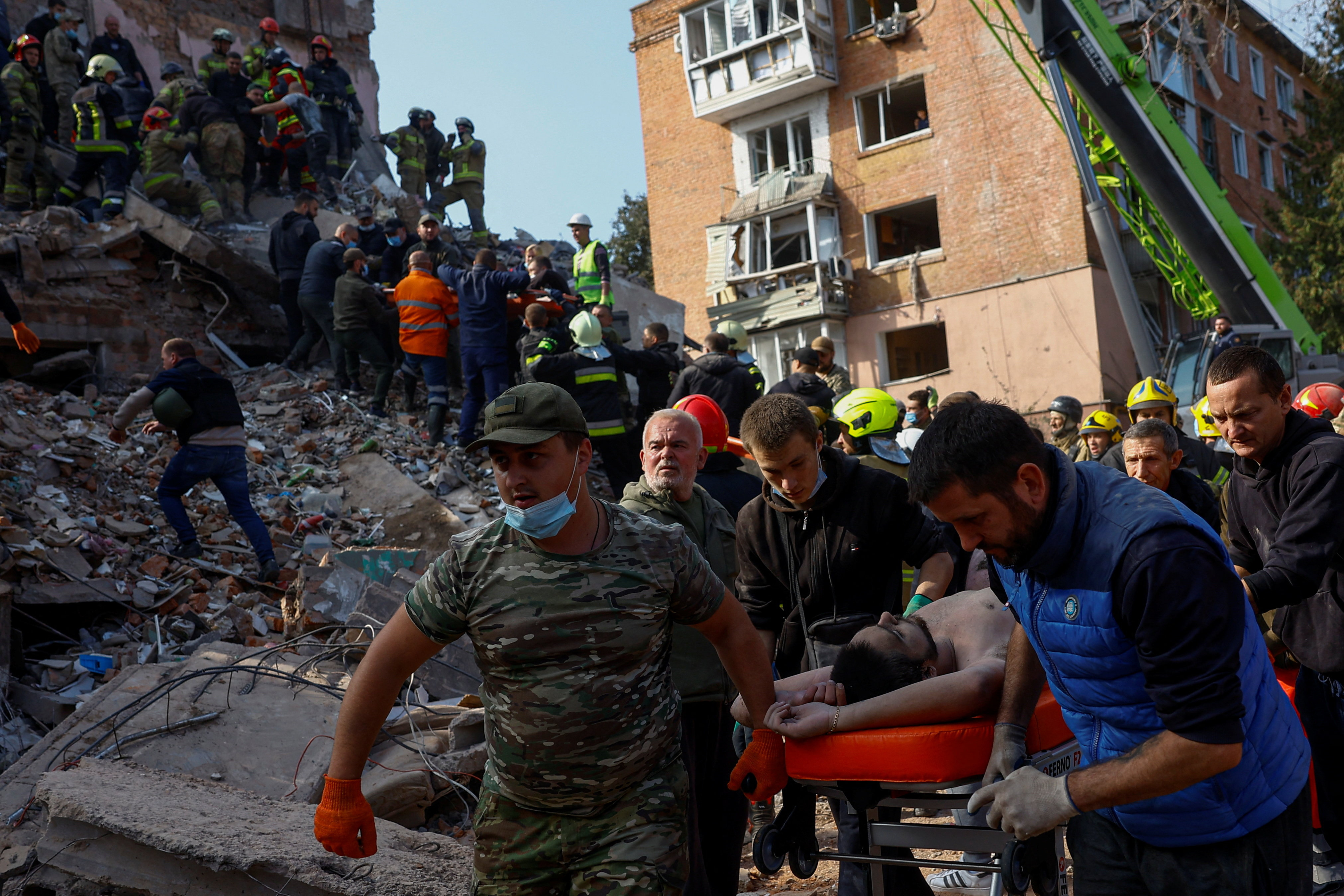cover Russian missiles and drones kill at least 32 in Ukraine, including children