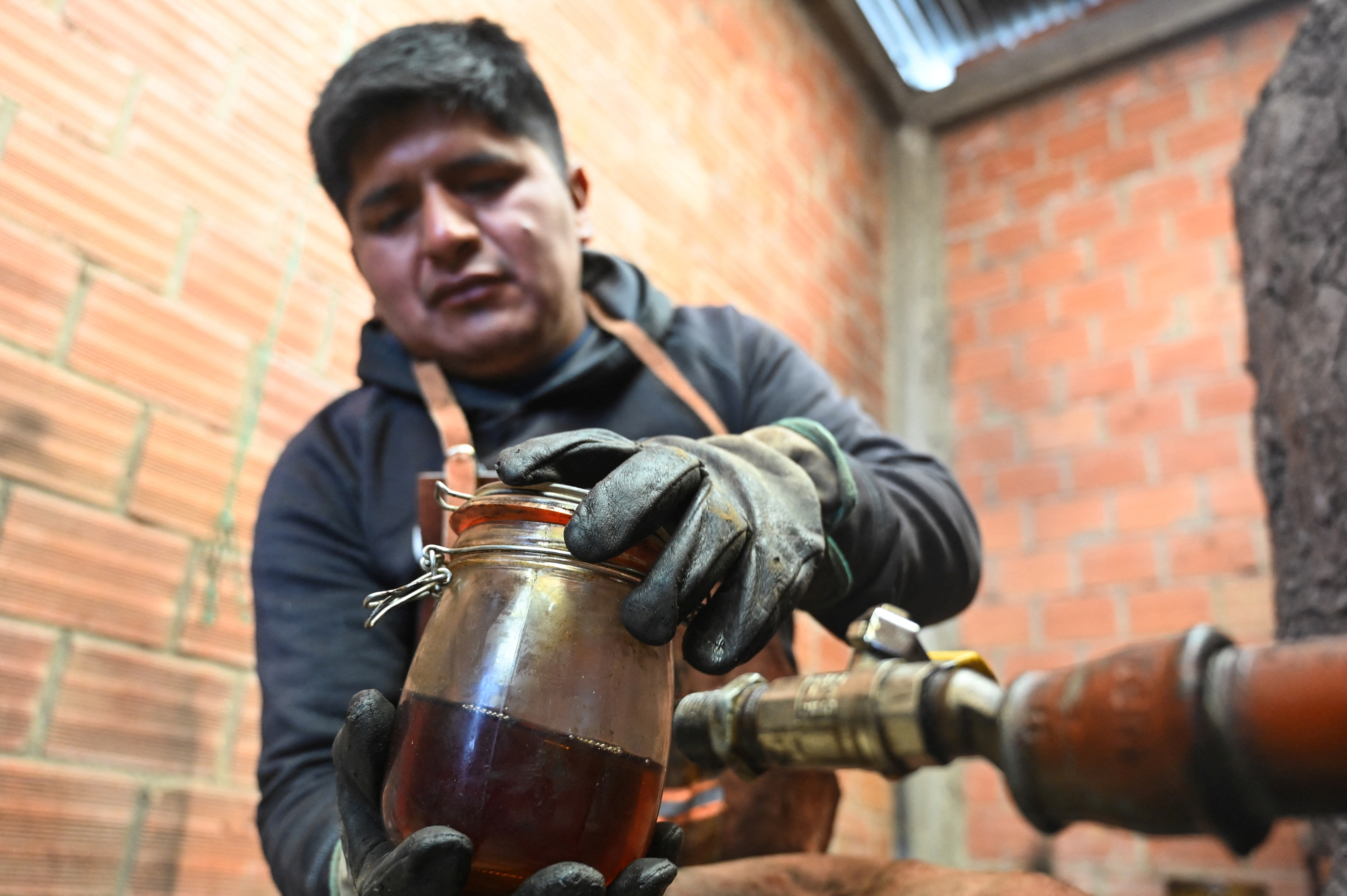 image As diesel prices soar, Bolivian farmer turns trash into tractor fuel